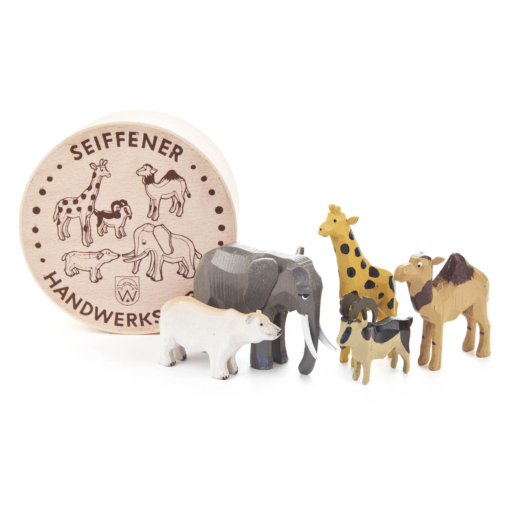 A set of small wooden zoo animals including an elephant, giraffe, camel, polar bear, and donkey in front of a round wooden box.