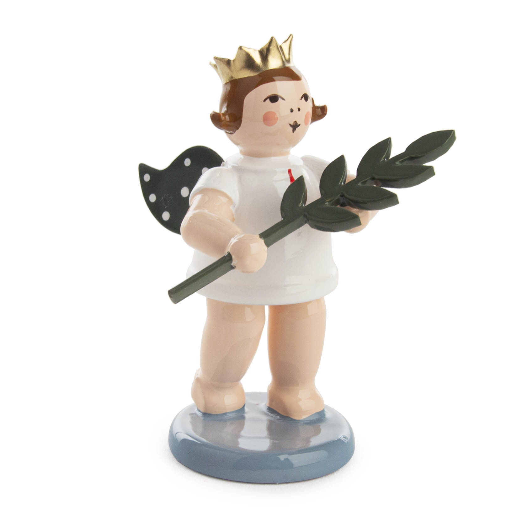 A ceramic angel figurine with a golden crown, holding a green olive branch, standing on a blue base. The angel has polka dot wings and wears a white outfit. im Dregeno Online Shop günstig kaufen