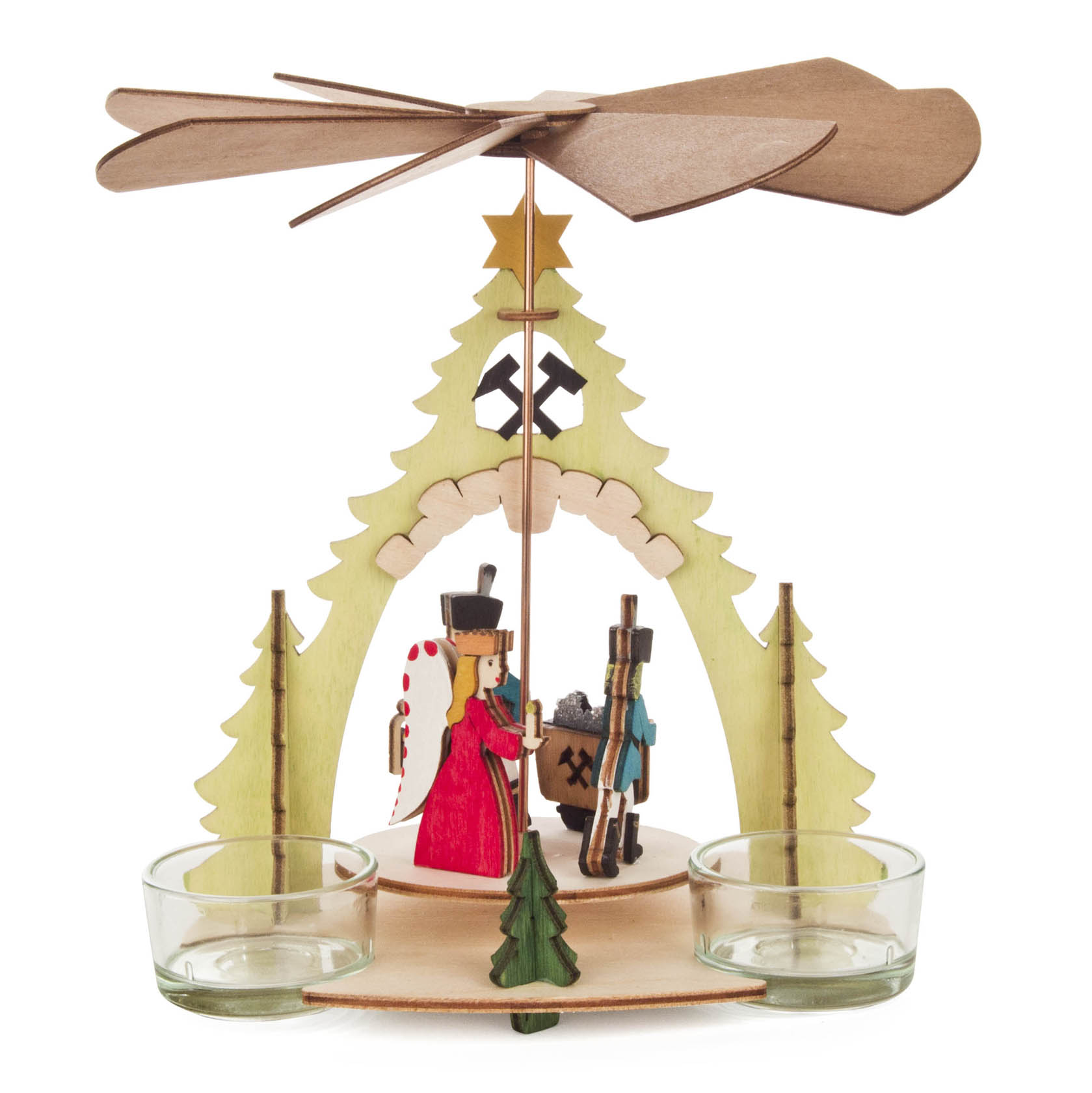 Wooden pyramid craft kit depicting Erzgebirge-style Christmas decoration with rotating blades, figurines, and two tealight holders.