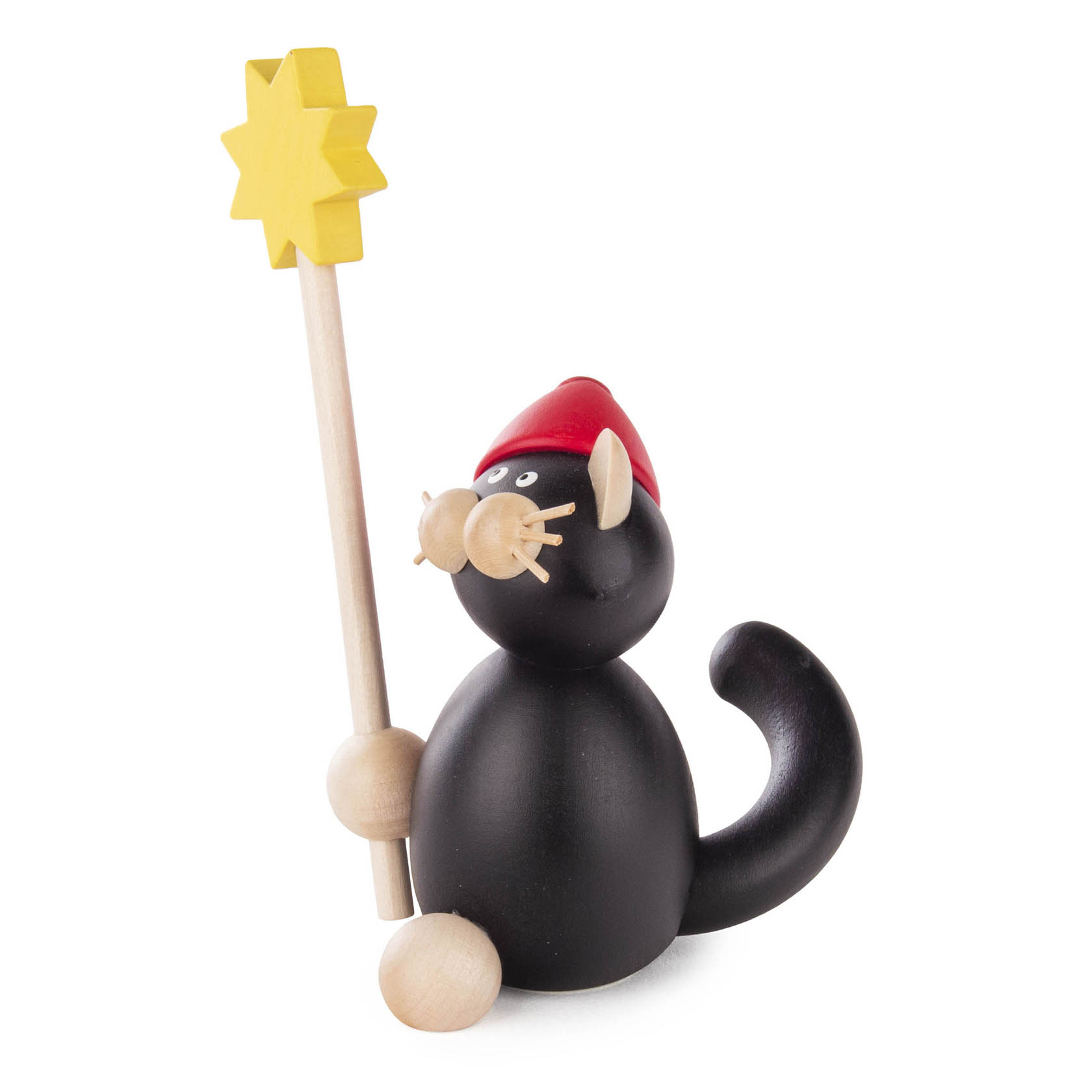 Figur einer schwarzen Katze namens Hilde mit roter Weihnachtsmütze, die einen gelben Stern auf einem Holzstab hält.