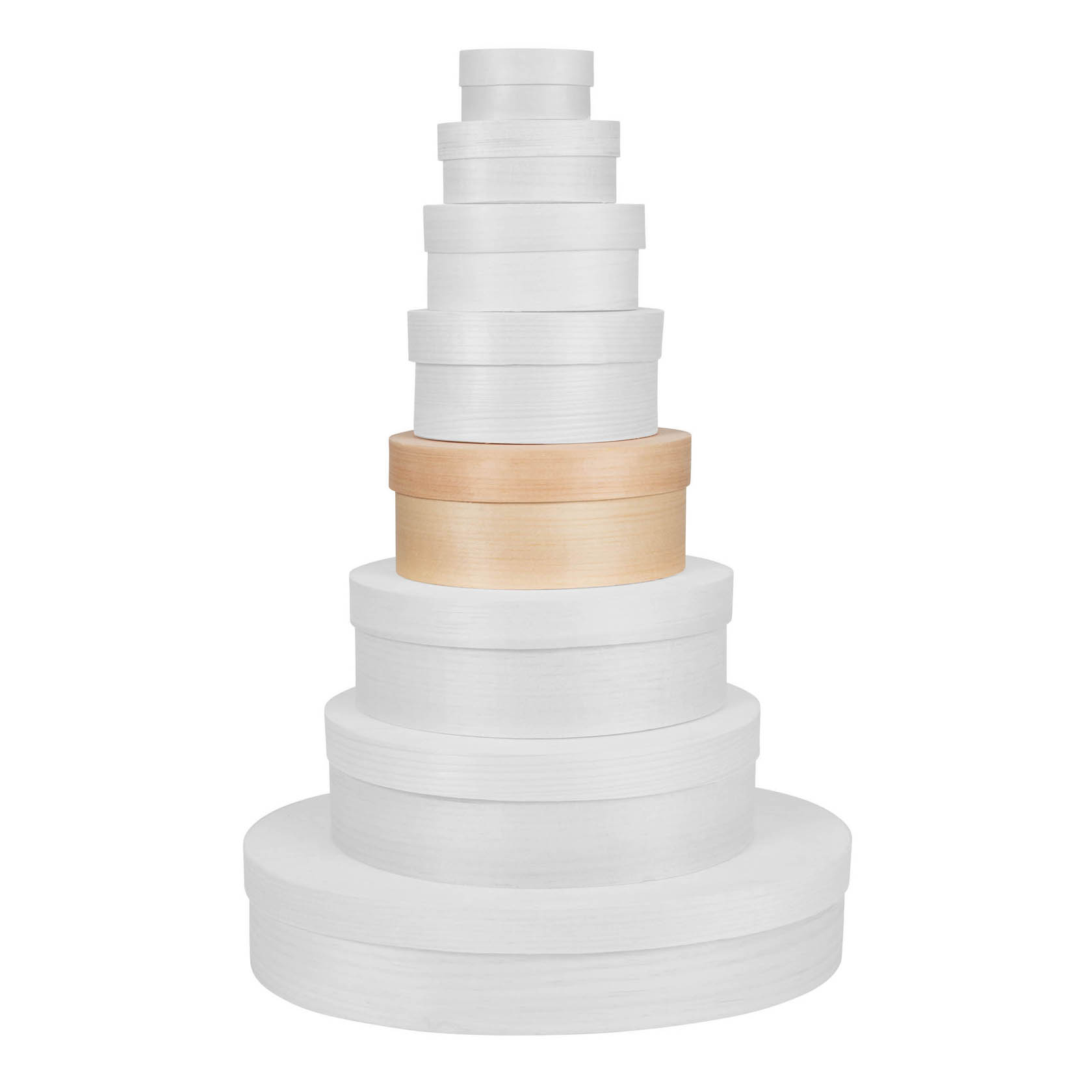 Stack of nine oval chipwood boxes in graduated sizes, eight white and one in natural wood color, placed in the middle.