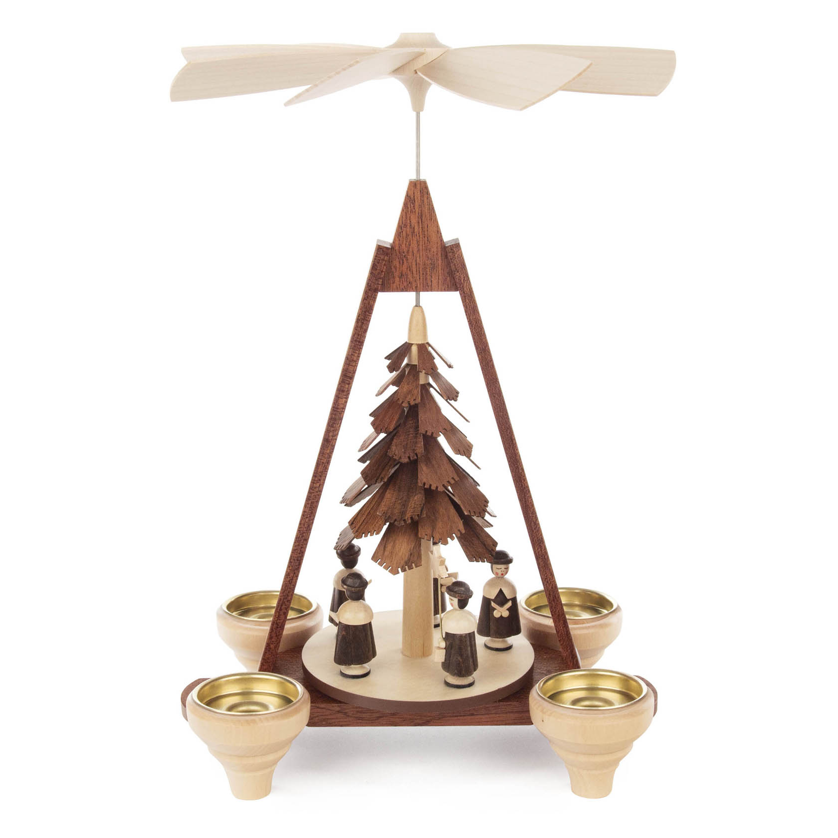 Wooden pyramid with a rotating propeller top, featuring four carved figures around a central wooden tree, set on a triangular wooden frame.