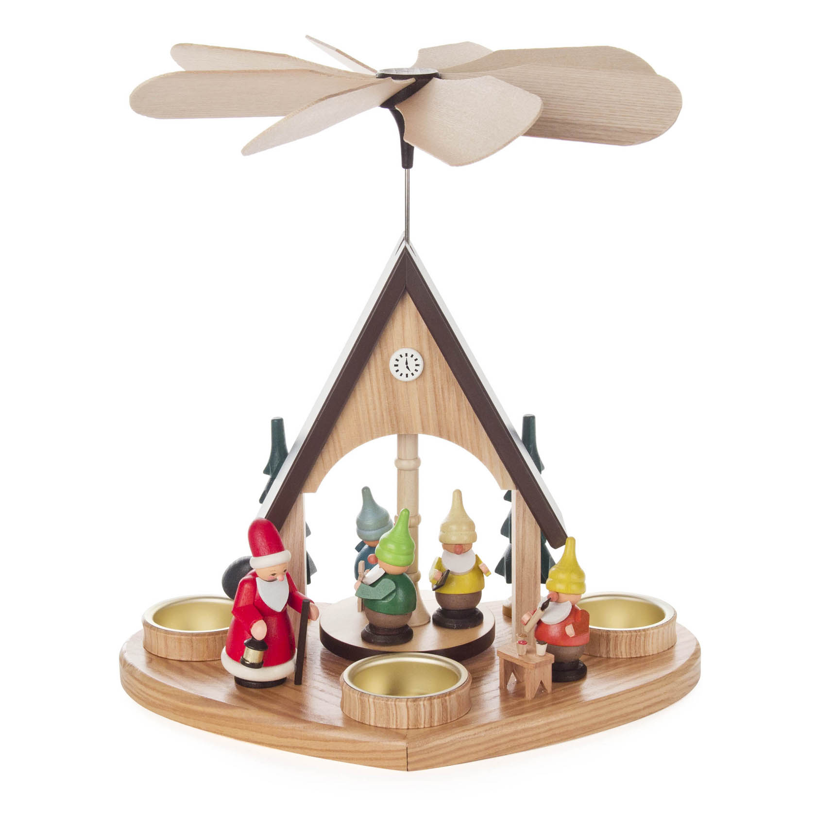 A wooden Christmas pyramid with a rotating propeller on top. It features small figurines of dwarves and Santa Claus, surrounding four tealight holders.