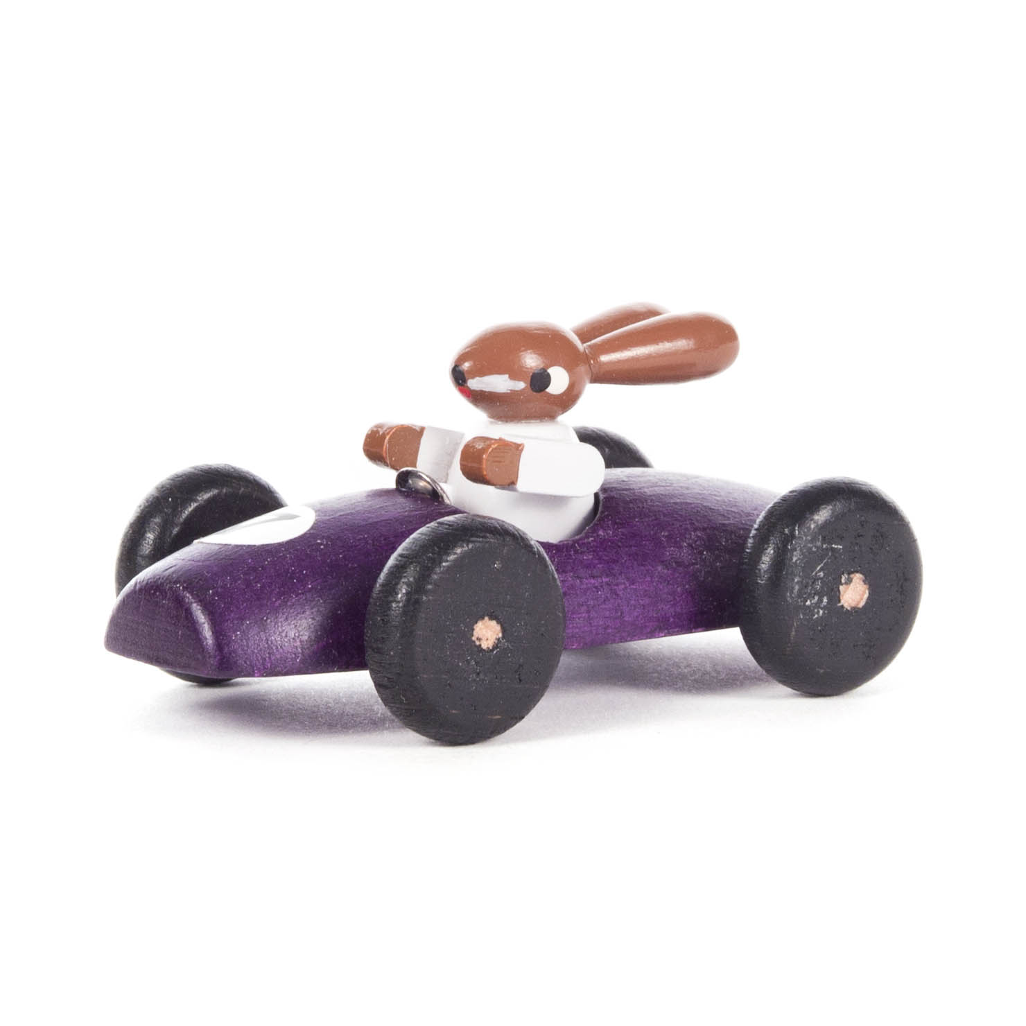 A small, purple toy racing car with a rabbit figure as the driver. im Dregeno Online Shop günstig kaufen