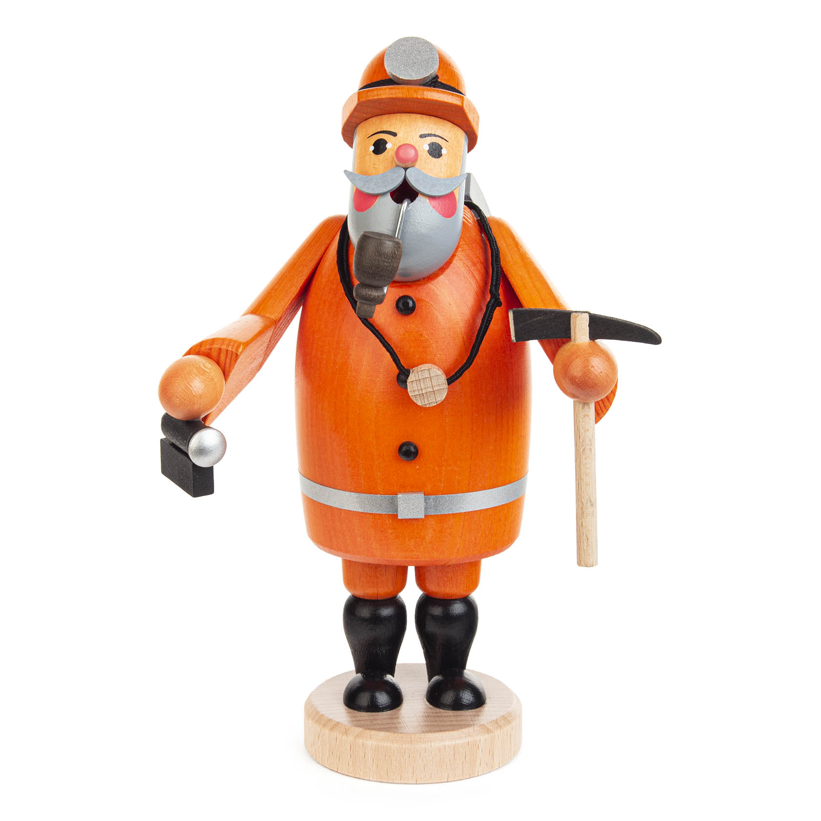 A wooden smoked figure of a miner dressed in an orange uniform, holding a pickaxe and a small lantern, with a pipe in the mouth and a helmet on the head.