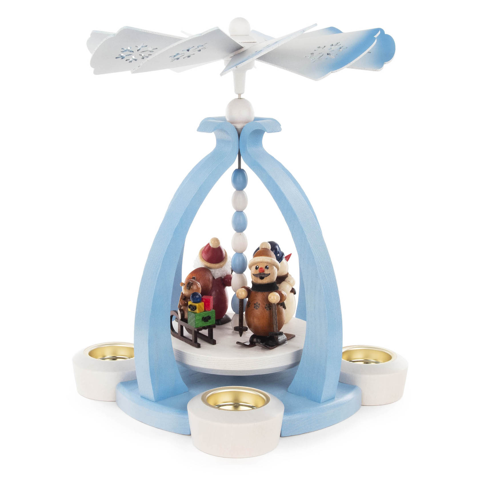 Holzpyramide mit Weihnachtsmann, Schneemann und Platz für Teelichter, oben eine blau-weiße Flügelstruktur, darunter Figuren mit Geschenken und Schlitten.