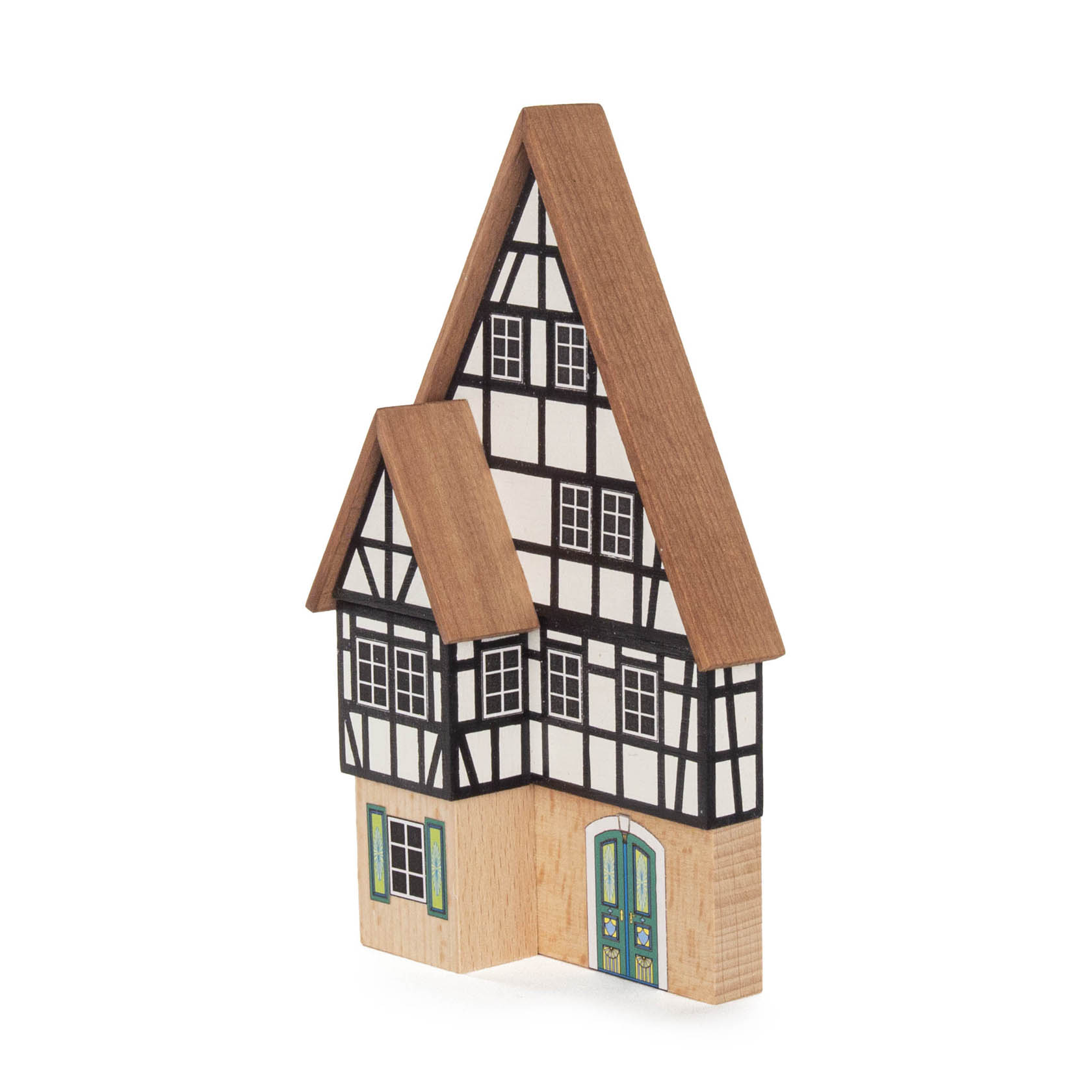 Model of a traditional half-timbered merchant house with a prominent gabled roof and two green doors at the base.