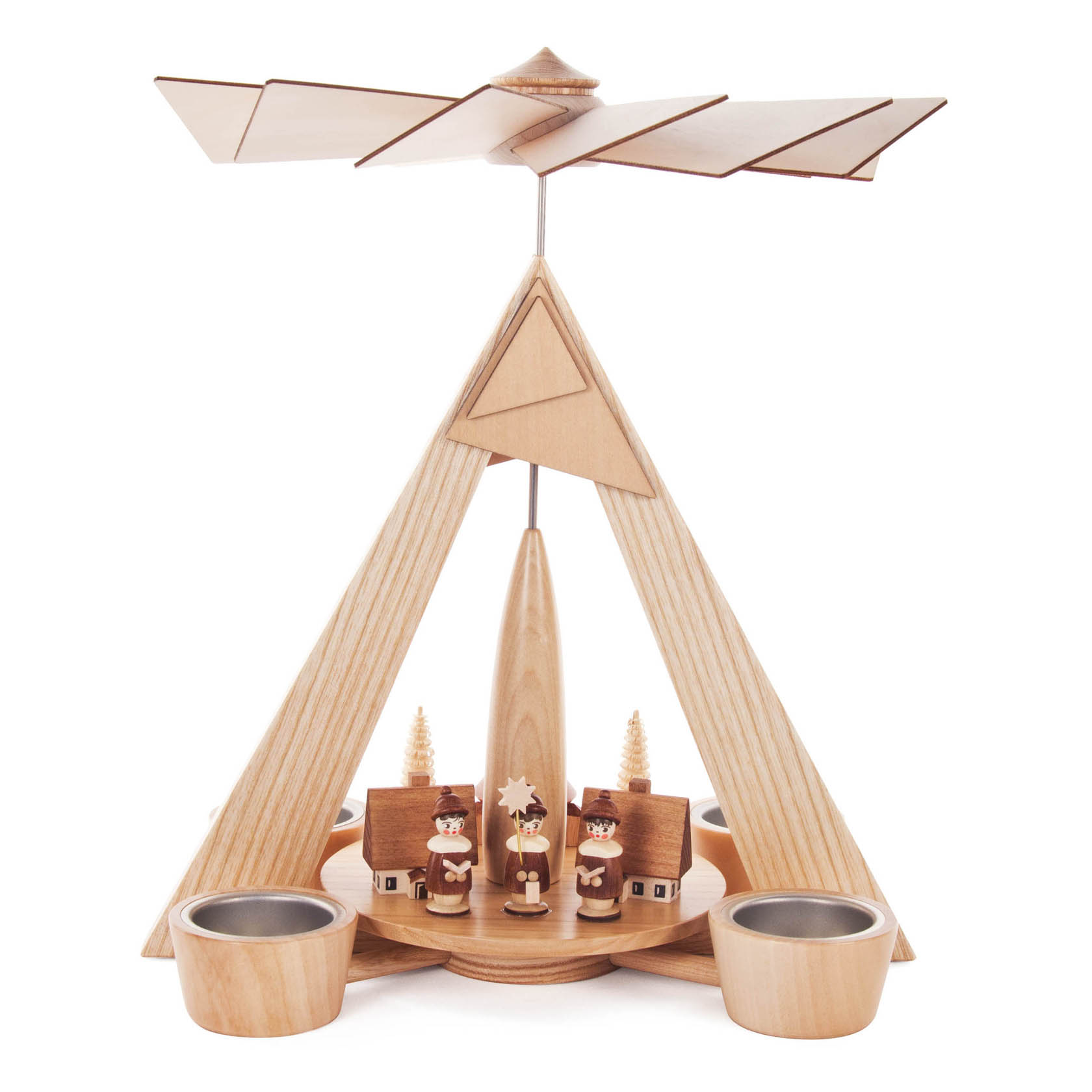 Holzpyramide mit drehbarem Flügel, darunter Seiffener Dorf mit drei Kurrende-Figuren und Häusern. Vier Teelichthalter zur Beleuchtung. im Dregeno Online Shop günstig kaufen
