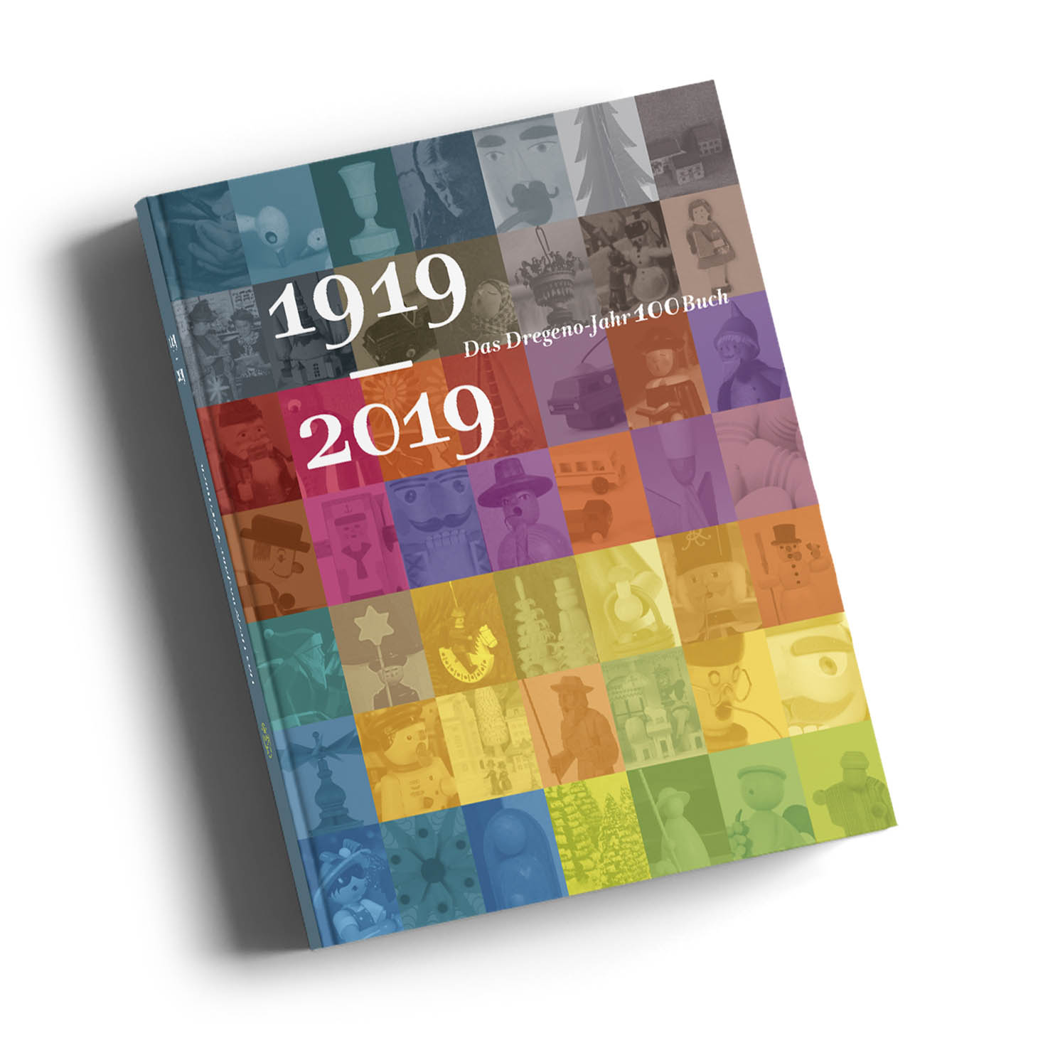 Buchcover des Dregeno Jahr100 Buches mit der Aufschrift '1919-2019 - Das Dregeno Jahr100 Buch' in bunten Quadraten. im Dregeno Online Shop günstig kaufen
