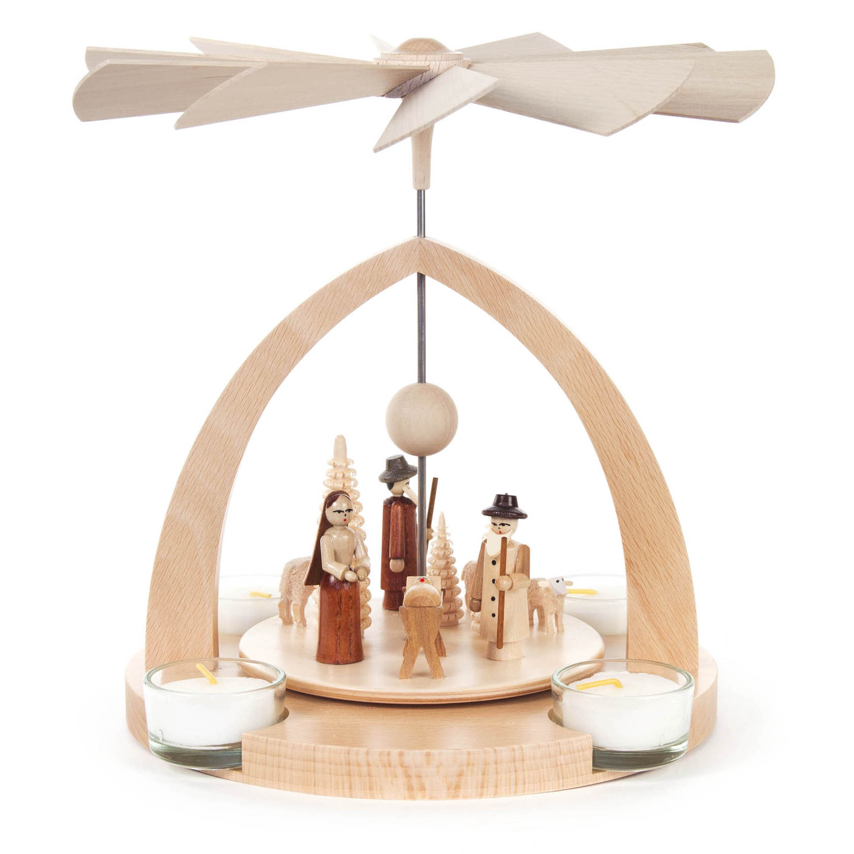 A wooden Christmas pyramid featuring a nativity scene with Mary, Joseph, baby Jesus, and two shepherds. Two tealight holders are placed on the base. im Dregeno Online Shop günstig kaufen
