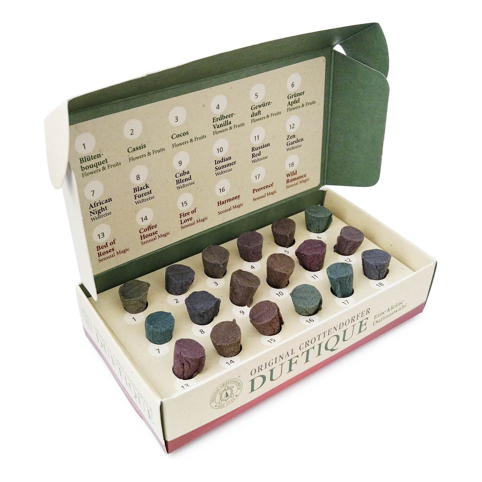 Open box showing various colored Crottendorfer incense cones, labeled with different scents like Ginger Apple and African Nights.