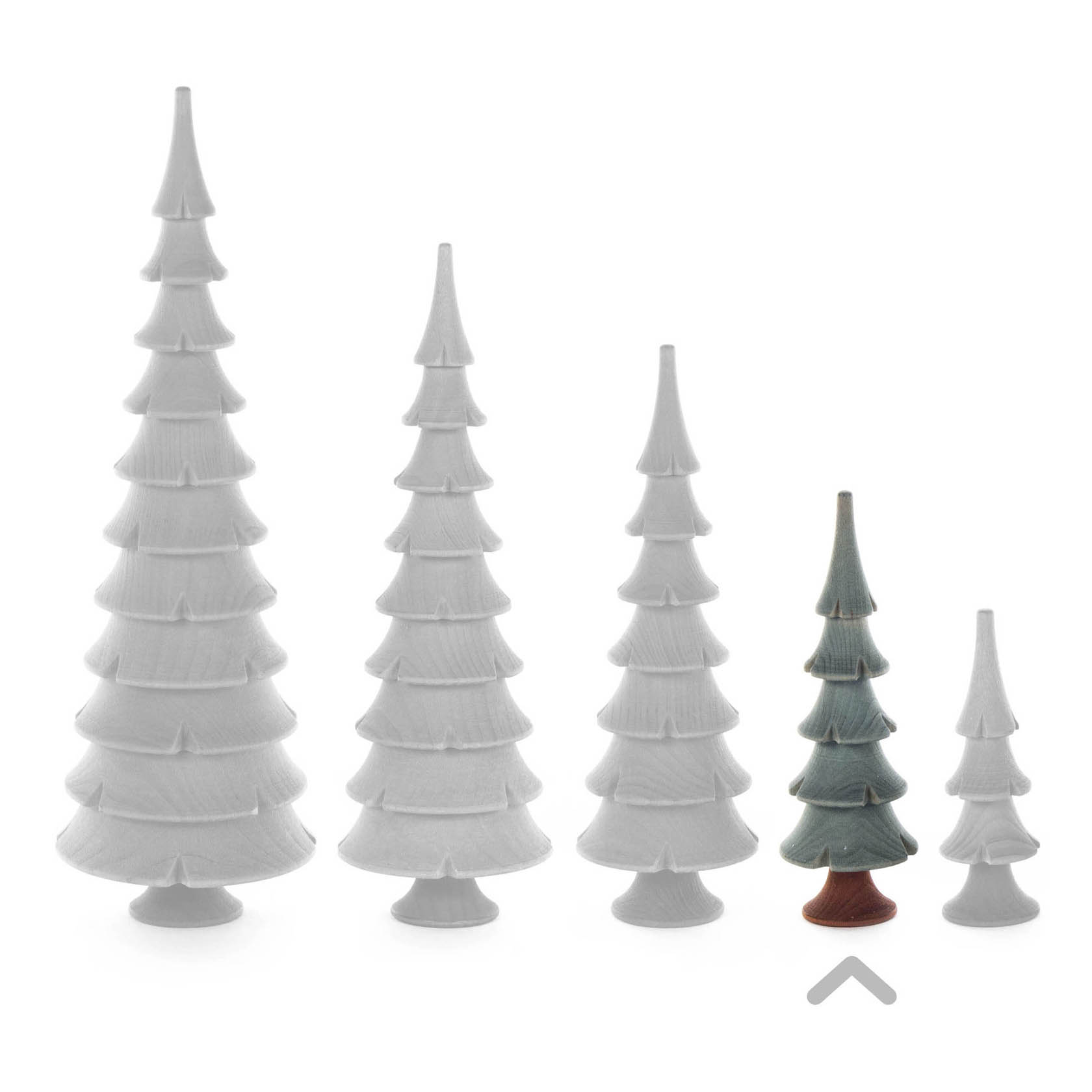 Four toy conifer trees made of solid wood, painted in shades of green, with varying heights, placed in a row from tallest to shortest.