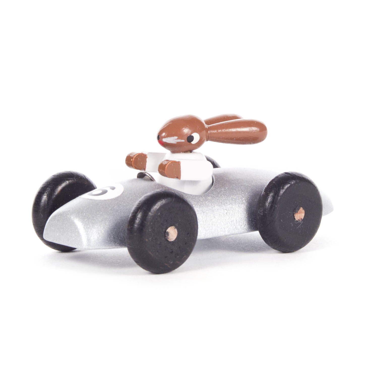 Kleines silbernes Spielzeugrennauto mit einem Hasen als Fahrer, der ein weißes Hemd trägt. Das Auto hat vier schwarze Räder. im Dregeno Online Shop günstig kaufen