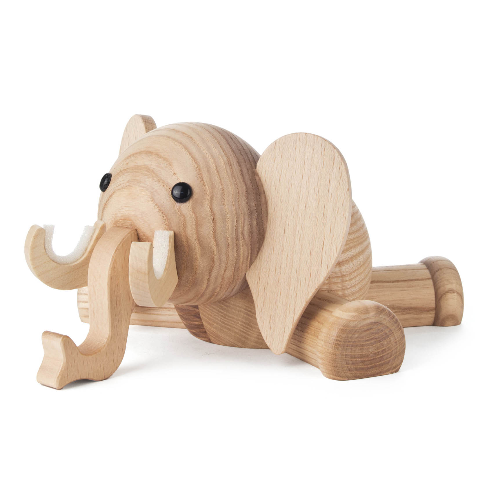 Holzfigur eines Elefanten, die als Brillenhalter dient. Der Elefant hat große Ohren, einen langen Rüssel und ist aus hellem Holz gefertigt.