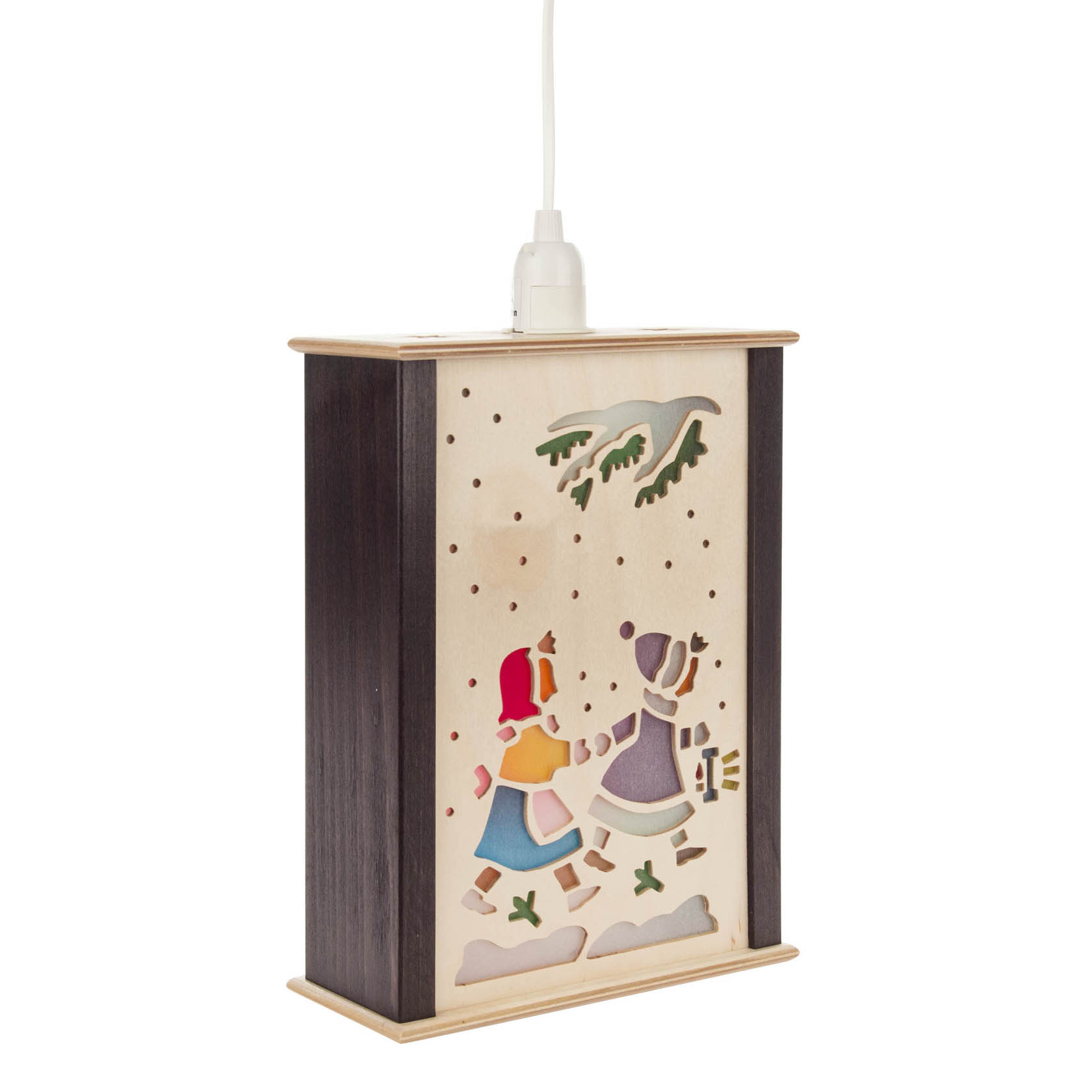 A small wooden window lantern depicting two children in winter clothes walking in snow with a snowy tree branch above.