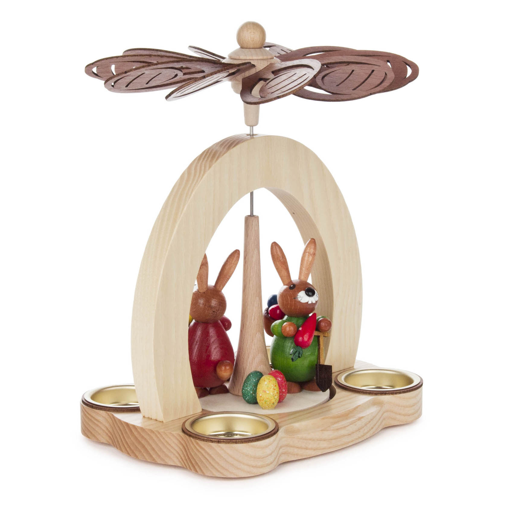 Holzpyramide mit zwei bemalten Hasen, einer in Rot mit Blumen und der andere in Grün. Die Pyramide hält Teelichter und hat drehbare Flügel oben.