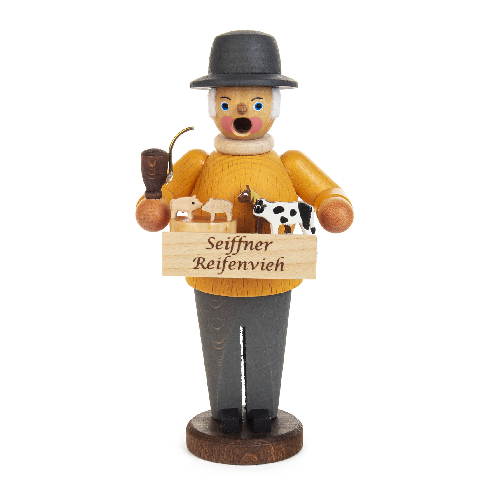 Mini-Räuchermann in traditioneller Kleidung mit Pfeife und Kiste, auf der 'Seiffener Reifenvieh' steht. In der Kiste befinden sich kleine Holztierfiguren. im Dregeno Online Shop günstig kaufen