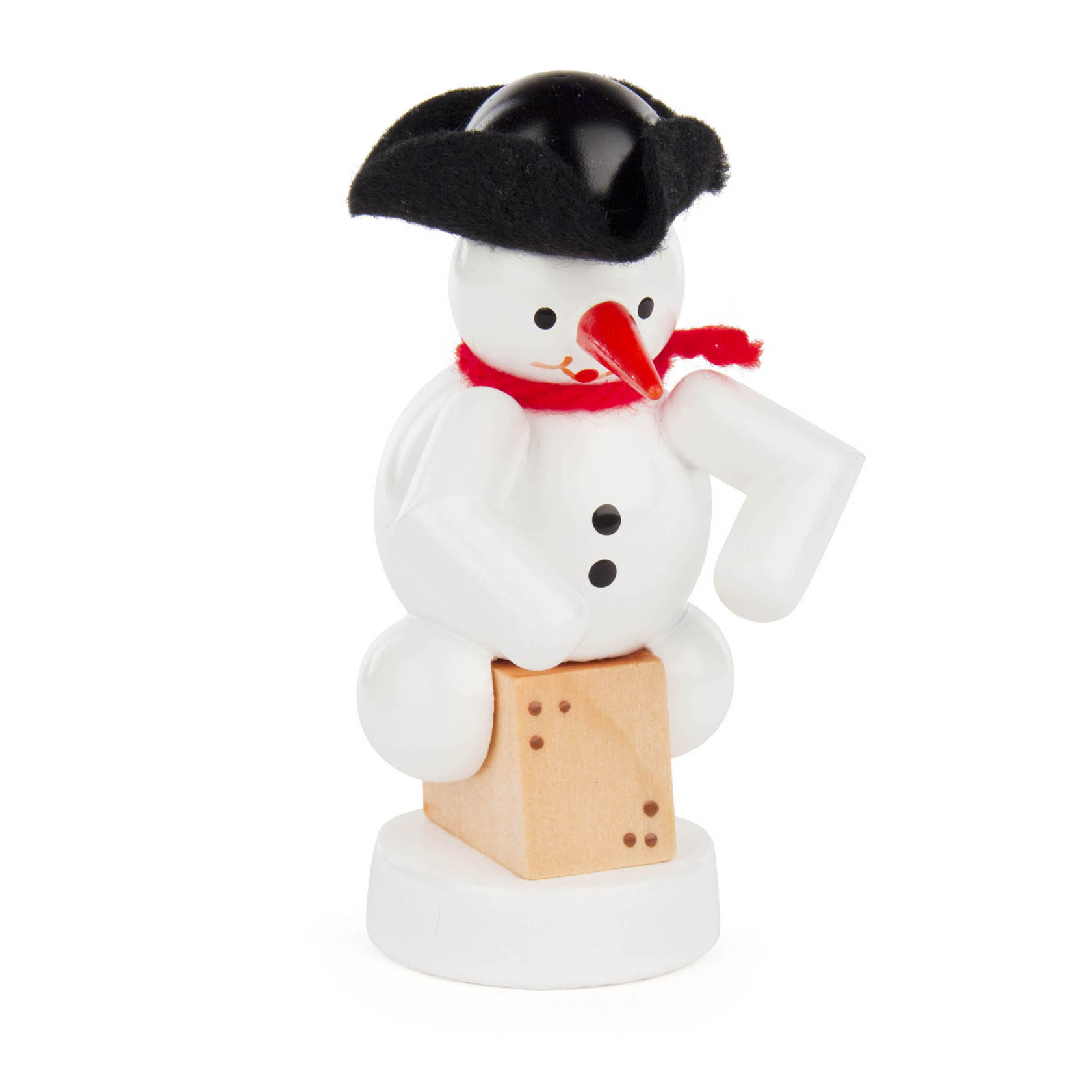 A white wooden snowman figure with a red scarf and a black hat, sitting on a small cajon drum. im Dregeno Online Shop günstig kaufen