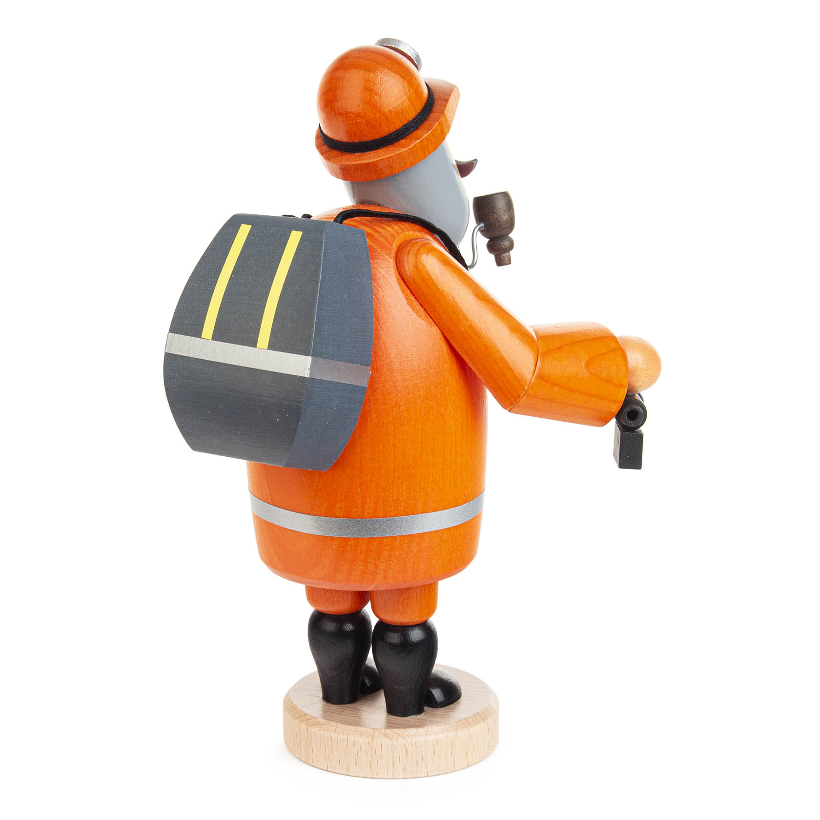 Wooden incense smoker figure of a rescue worker dressed in orange mining gear, holding a lantern with a backpack on the back.