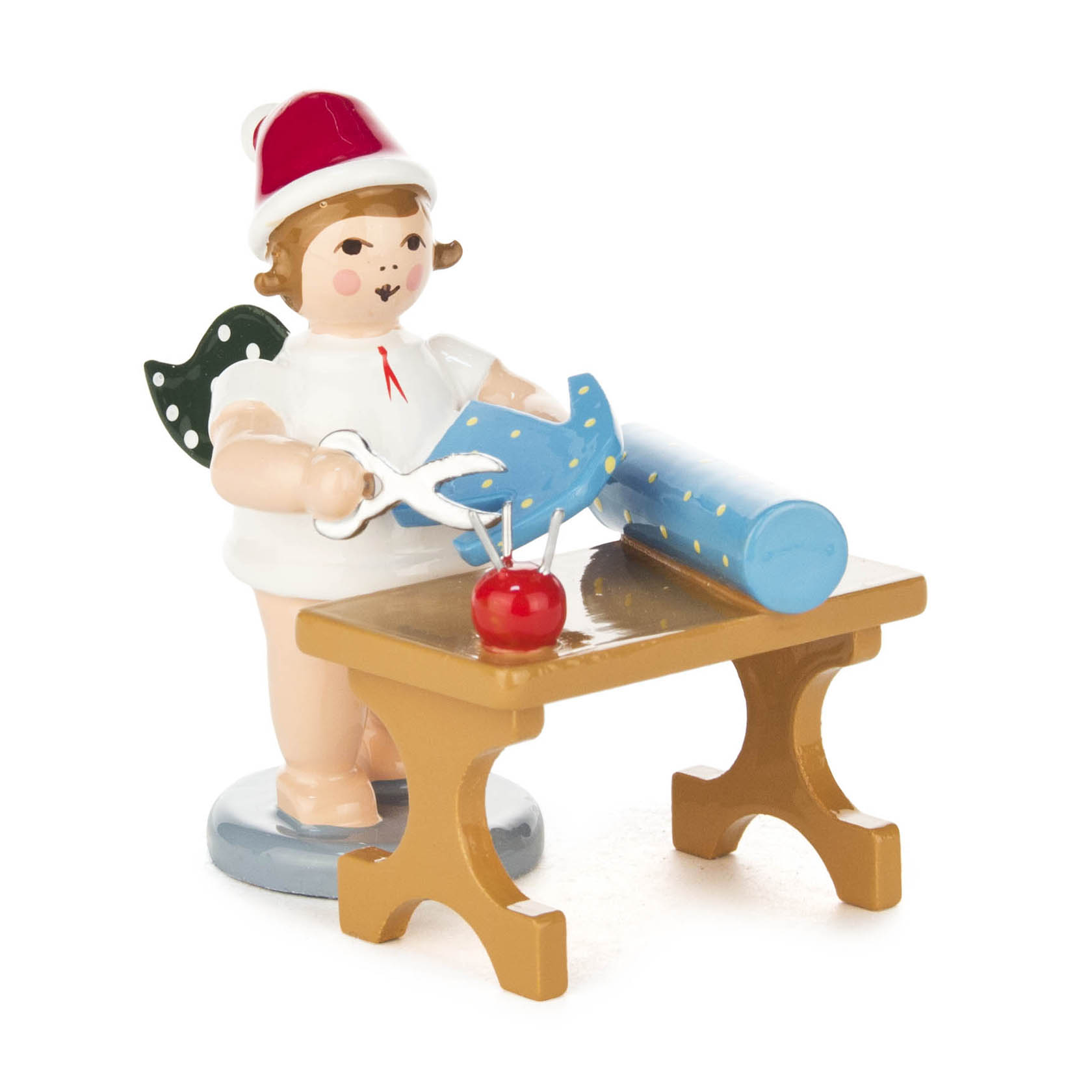 Engel mit Schere, Stoff und Mütze am Schneidertisch im Dregeno Online Shop günstig kaufen