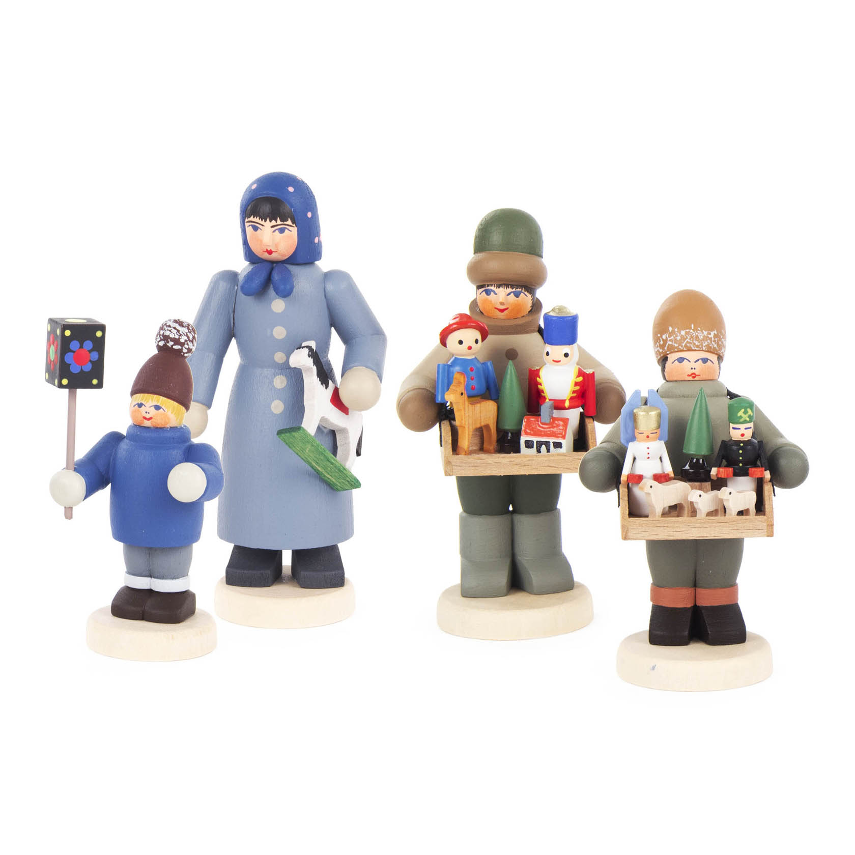 Four traditional wooden figurines: a woman in blue with a goose, a child with a lantern, and two children holding trays with toys. im Dregeno Online Shop günstig kaufen