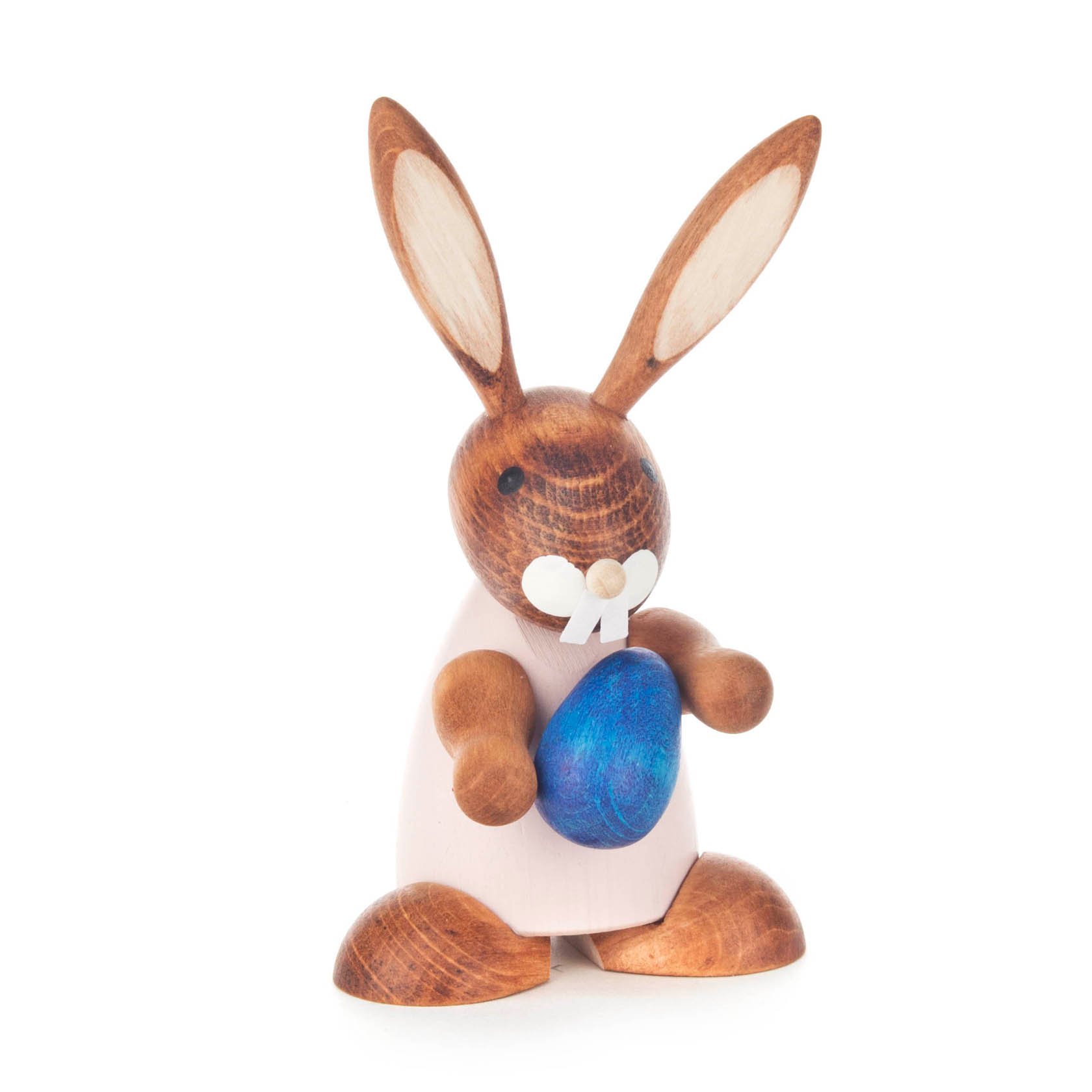 Holzhase mit lila Bemalung hält ein blaues Ei in den Händen. im Dregeno Online Shop günstig kaufen