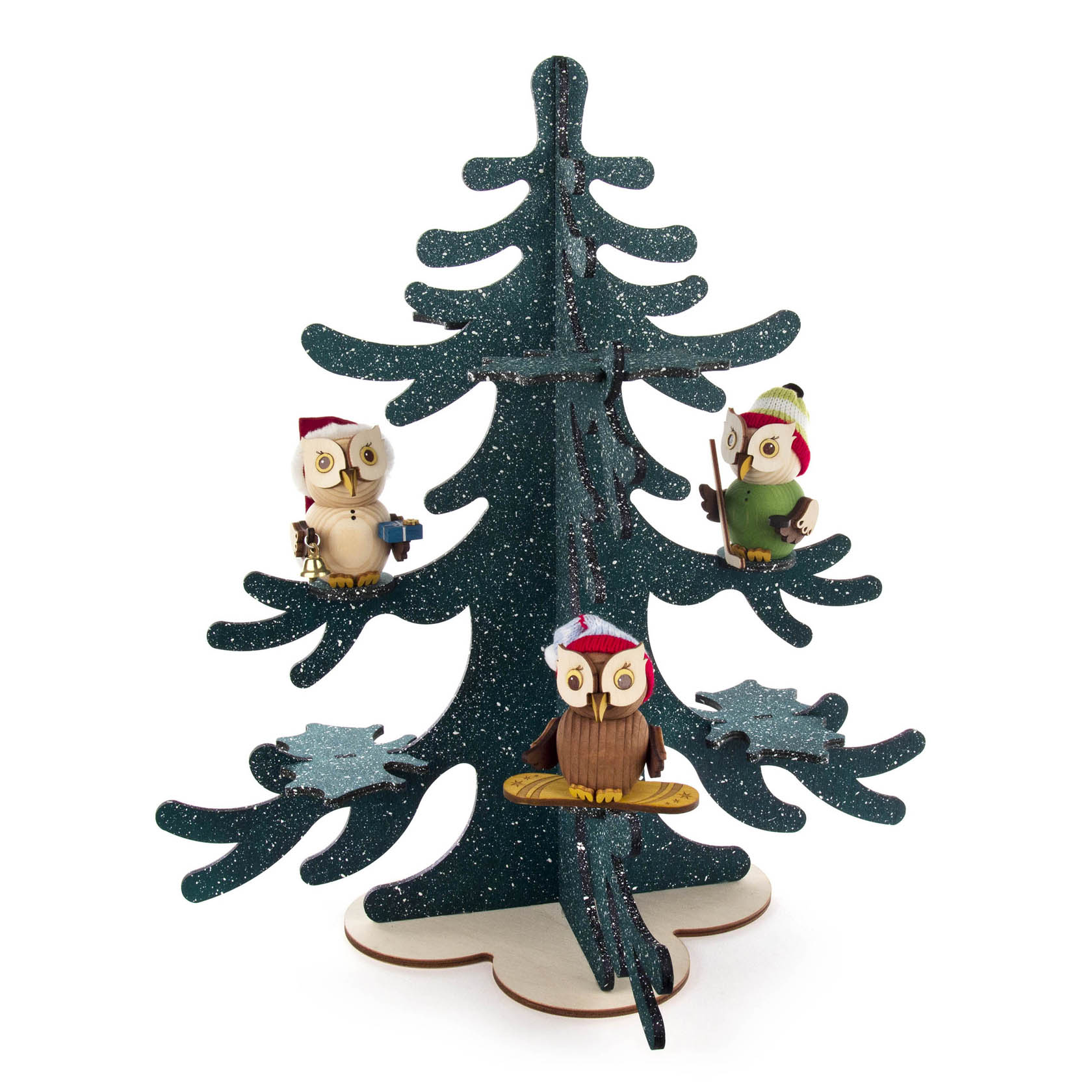 Three small owl figurines in winter hats perched on a blue glittery tree with curved branches, resembling a Christmas tree.