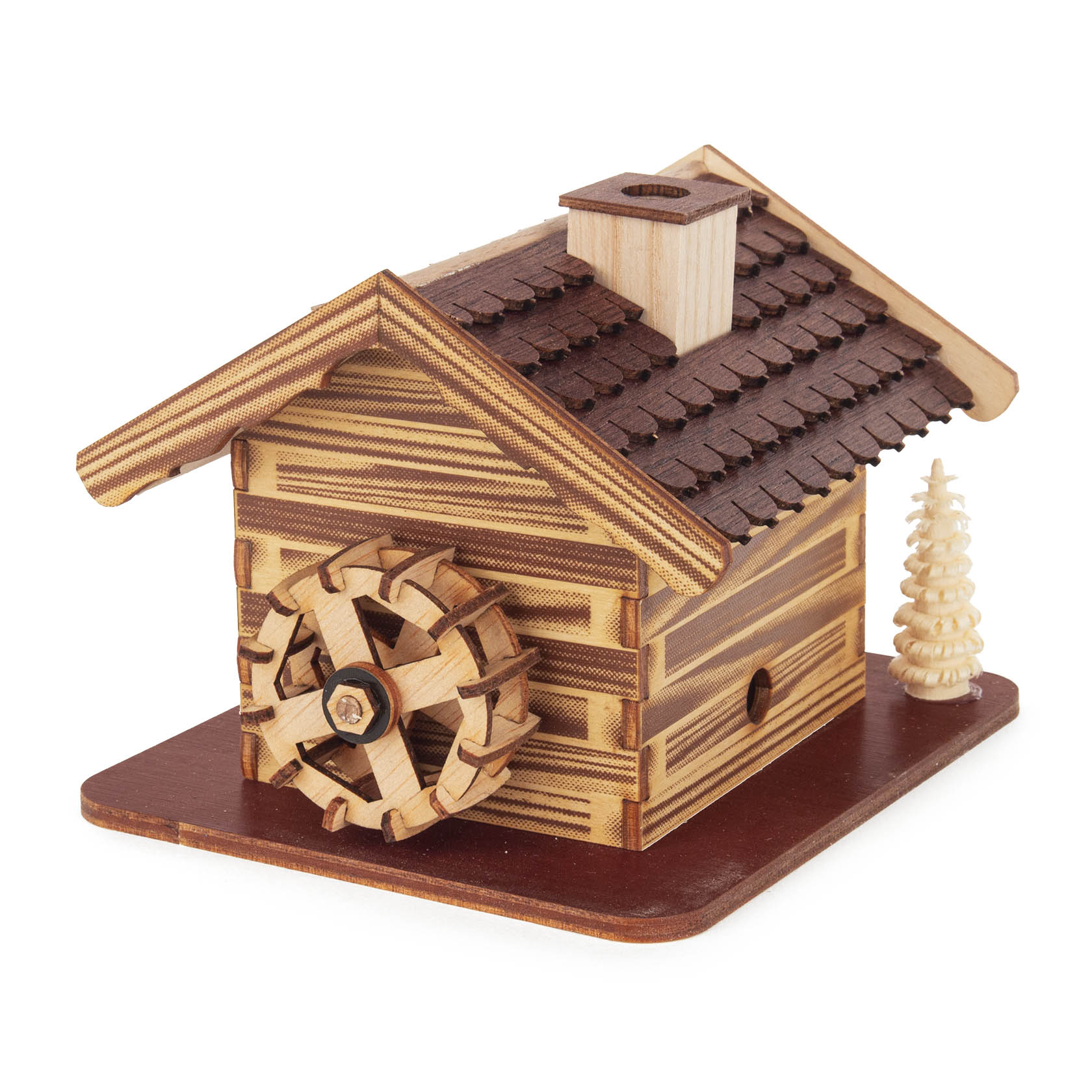 A wooden incense smoker house model, shaped like a log cabin with a shingle roof, spinning wheel, and small pine tree decoration.