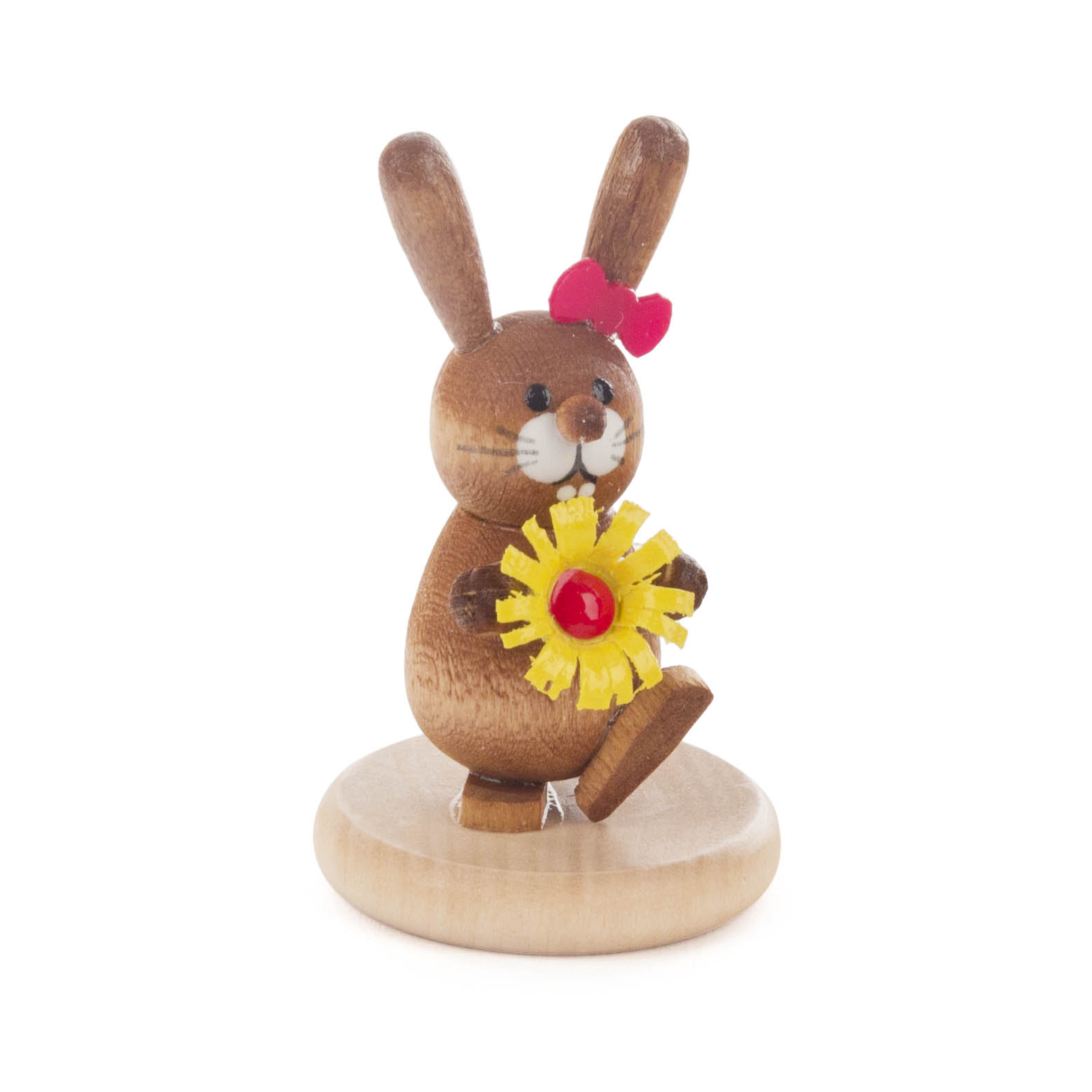 Hase mit Blume auf Sockel farbig, lasiert