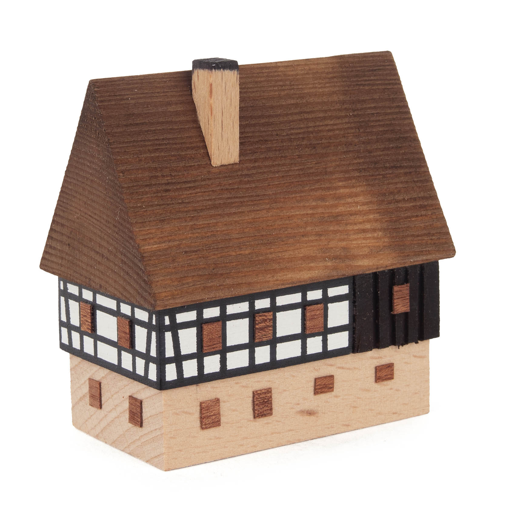 A two-story farmhouse model with a wooden upper floor featuring a timber-frame design and wooden shingles on the roof.