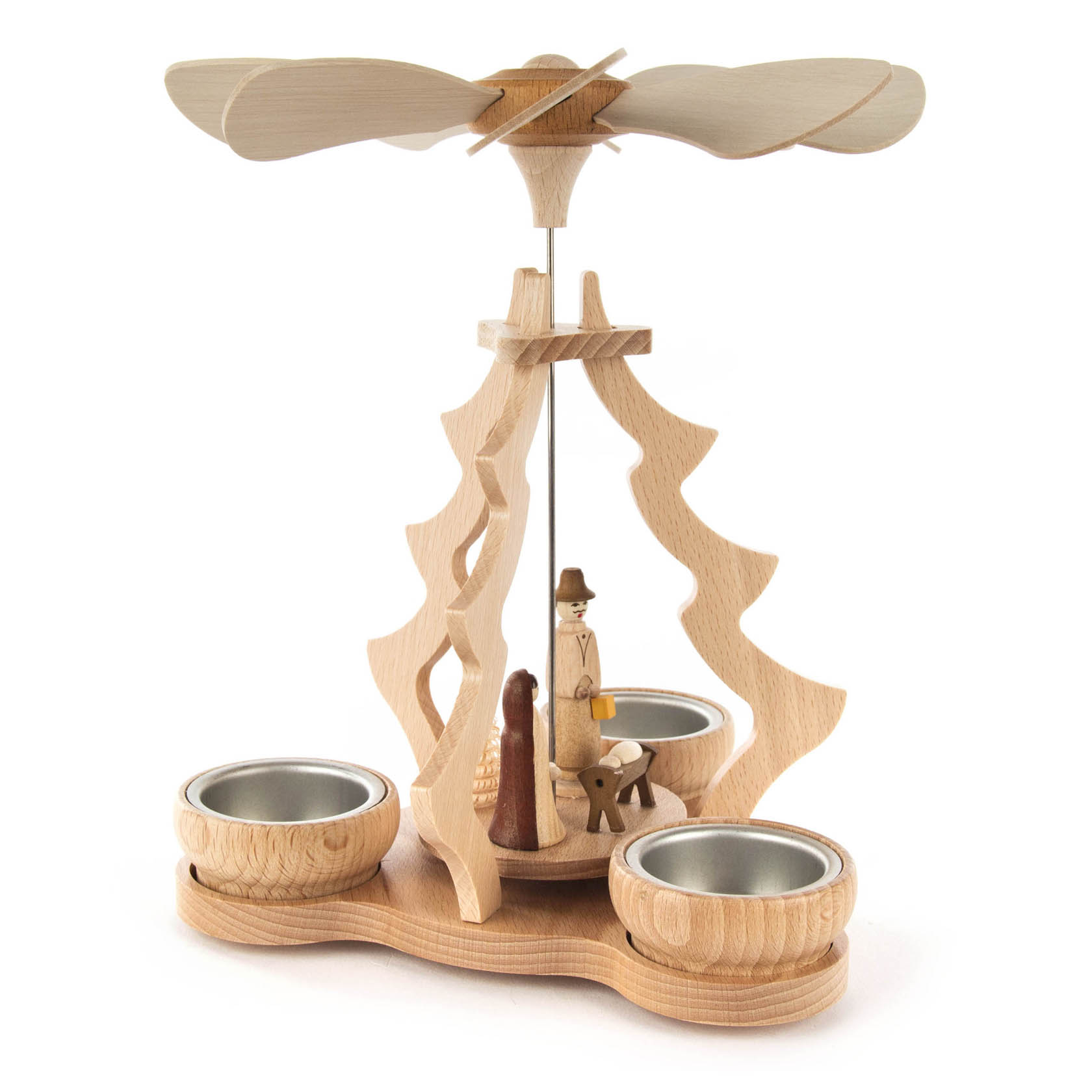 Holzpyramide für Teelichter mit einer Szene der Geburt Christi, Maria, Josef und Jesuskind in der Krippe unter einem sich drehenden Flügelrad.
