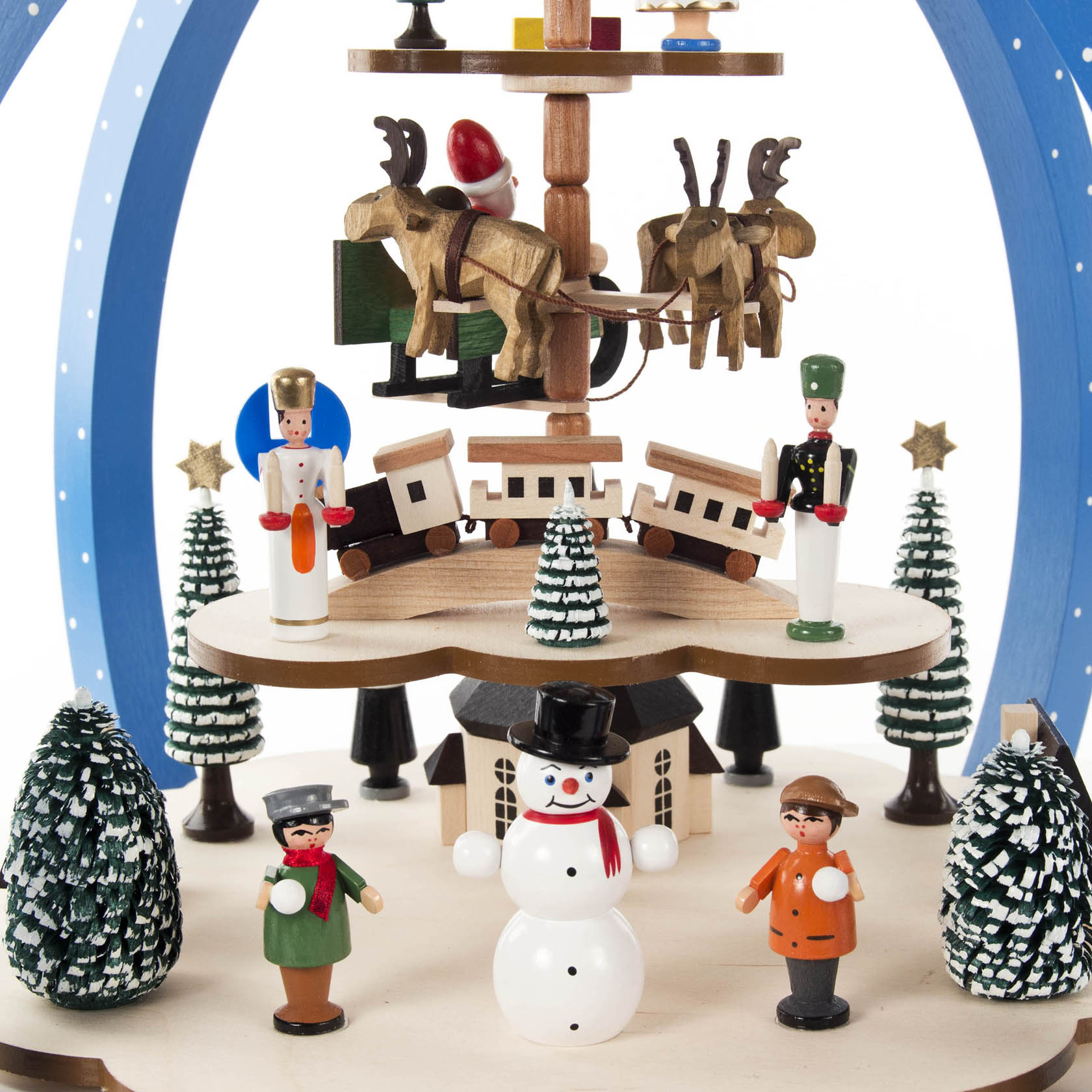 Colorful pyramid for tealights featuring a winter scene with a snowman, three figures, a train, and Santa with reindeer.