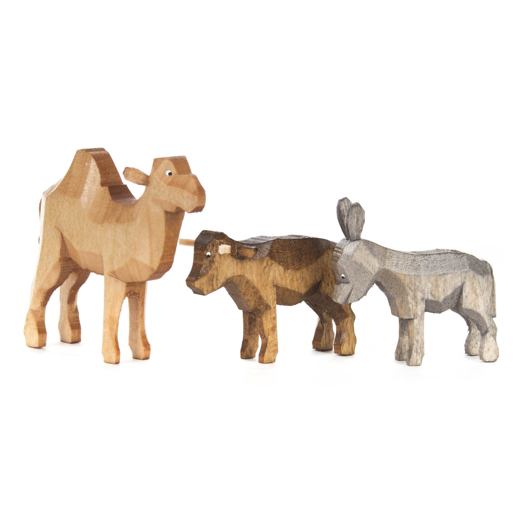 Holzfiguren von einem Kamel, einem Ochsen und einem Esel nebeneinander aufgestellt. im Dregeno Online Shop günstig kaufen