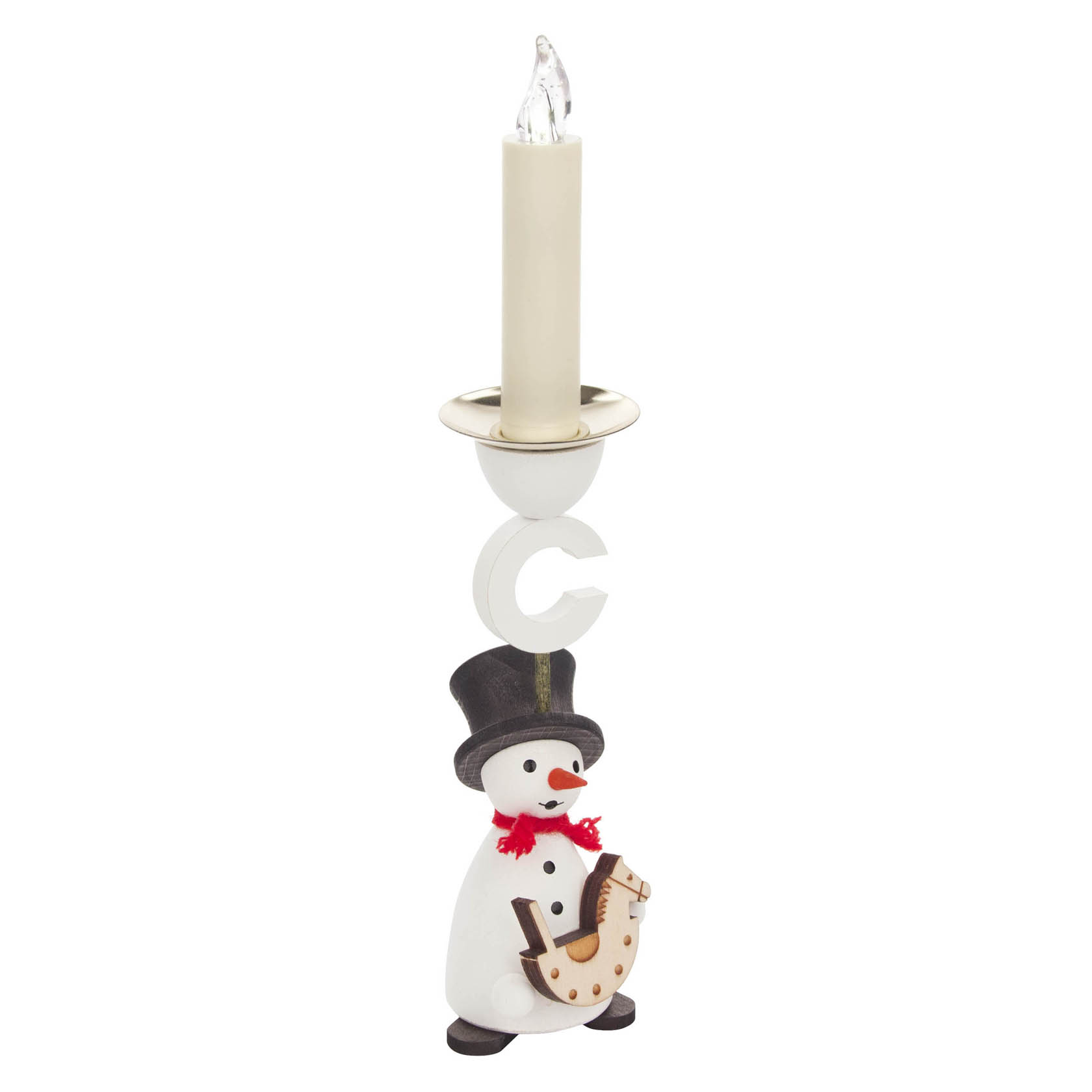 A decorative snowman candle holder with a top hat, red scarf, holding a small wooden rocking horse. It holds a candle with a faux flame on top.