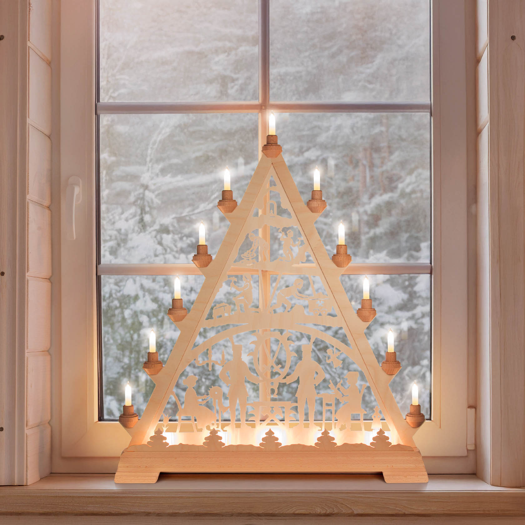 A wooden triangular Christmas arch with Erzgebirge motifs, featuring illuminated candle lights, placed on a windowsill with a snowy outdoor background.