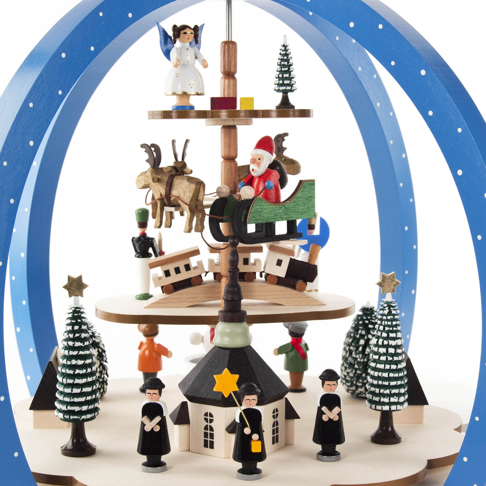 Colorful pyramid 'Cloud Magic' for tealights with wooden figurines including Santa in a sleigh, angel, trees, and choirboys.