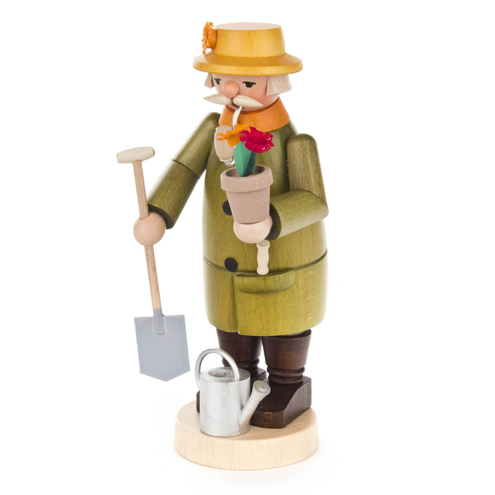Wooden smoker figurine of a gardener holding a potted flower and spade, wearing a hat and green coat, standing on a round base with a watering can.