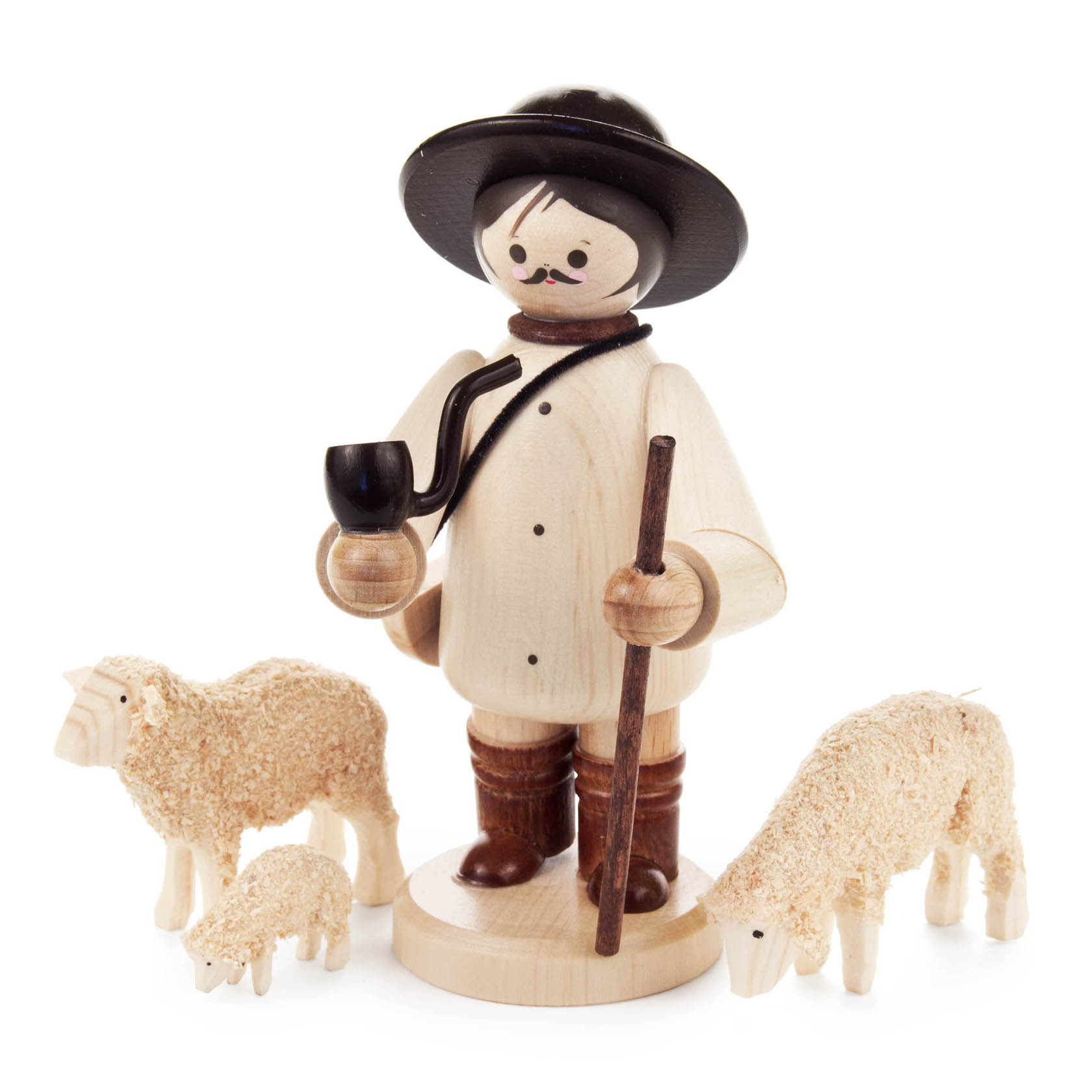A wooden shepherd figure wearing a black hat and holding a staff, accompanied by three sheep in various positions. im Dregeno Online Shop günstig kaufen