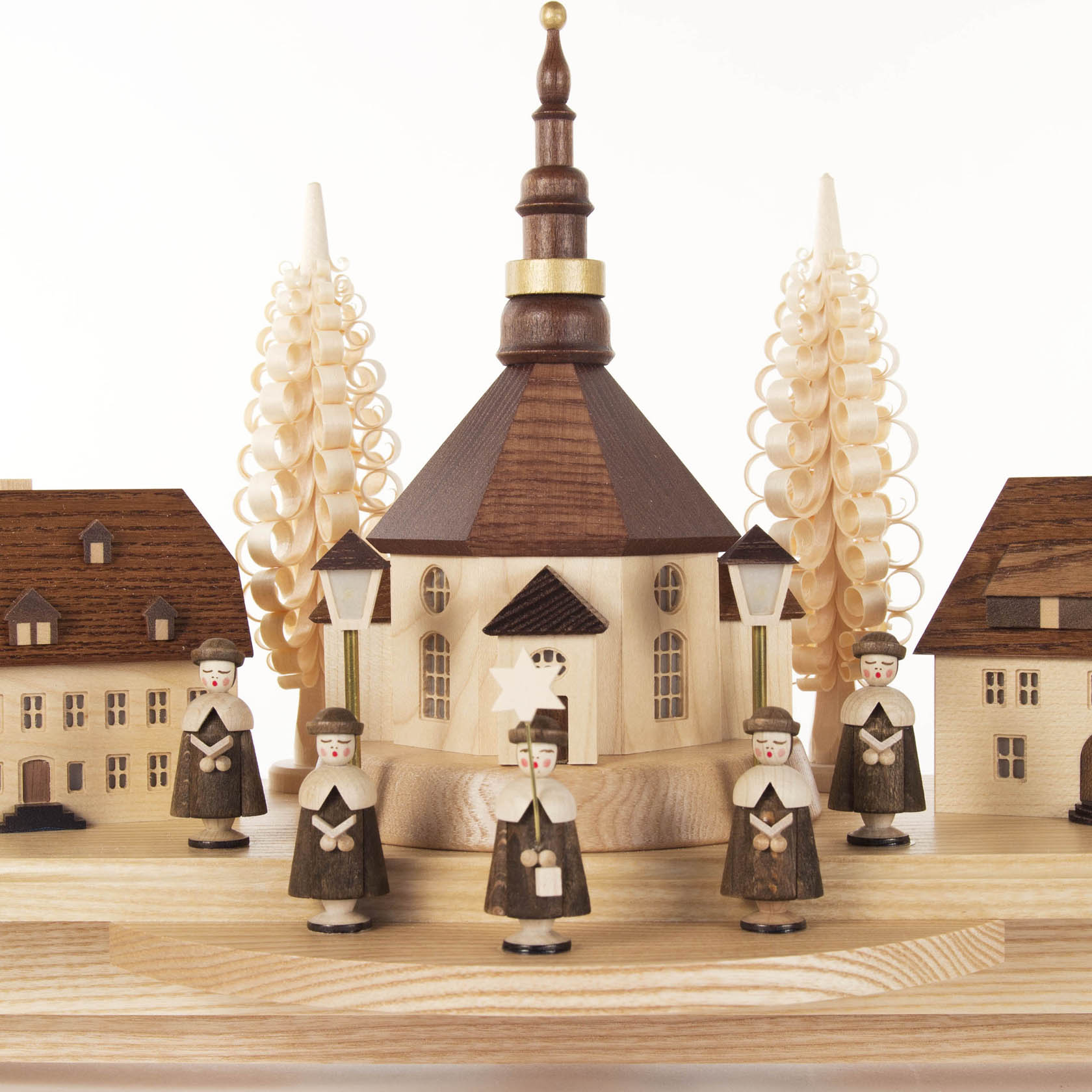 Wooden arch with Seiffen village scene. Includes a church, houses, and choir figures. Electrically illuminated with lit buildings.