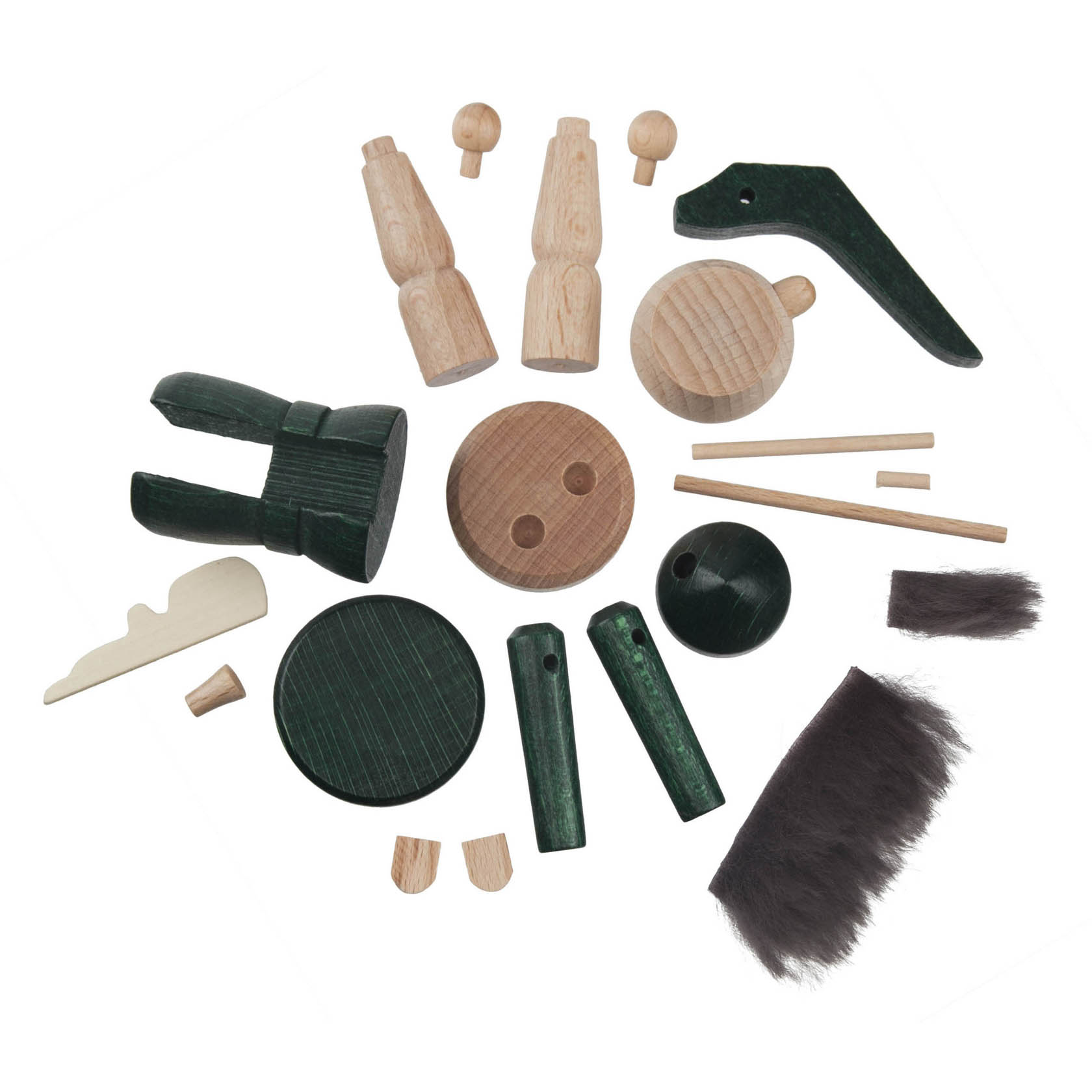 A DIY nutcracker kit featuring wooden parts in green and natural wood colors, including body pieces, head, hat, wooden pegs, and faux fur beard.