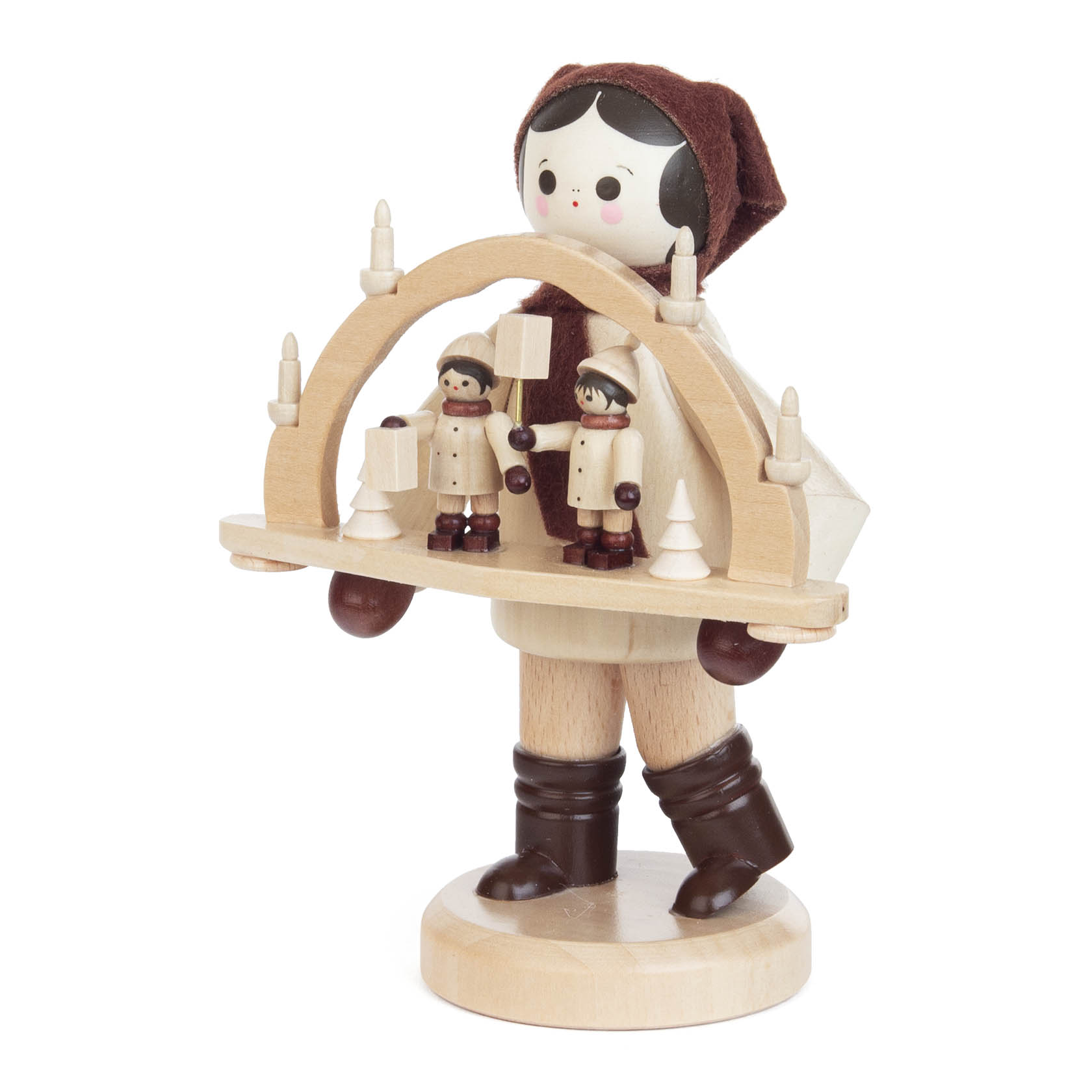 Wooden figurine of a girl dressed in winter clothing, holding a Schwibbogen with two figures and trees, featuring natural wood tones.