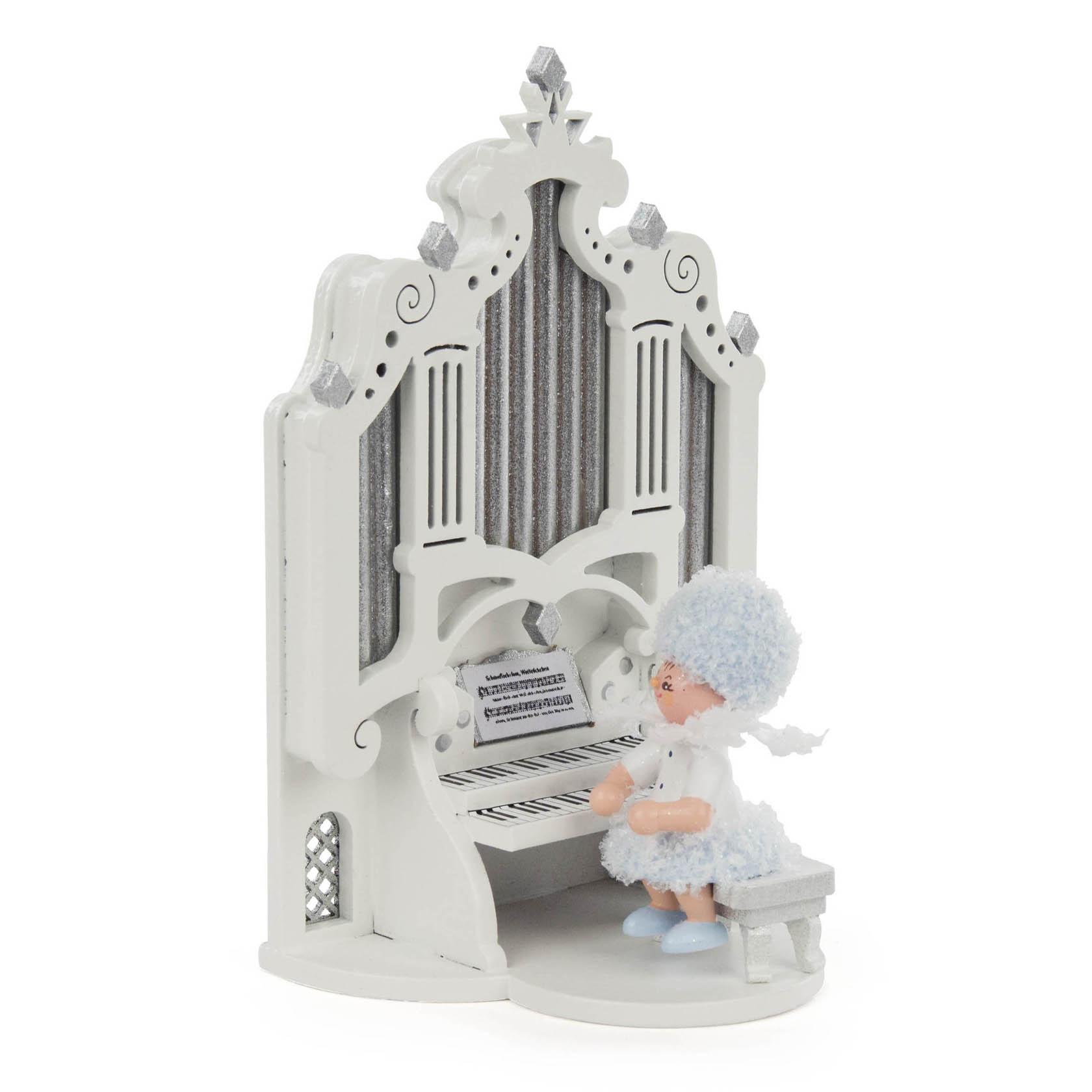 Figur eines Schneeflöckchens in blau-weißem Kleid, am Spiel einer kleinen, weißen Orgel sitzend. im Dregeno Online Shop günstig kaufen
