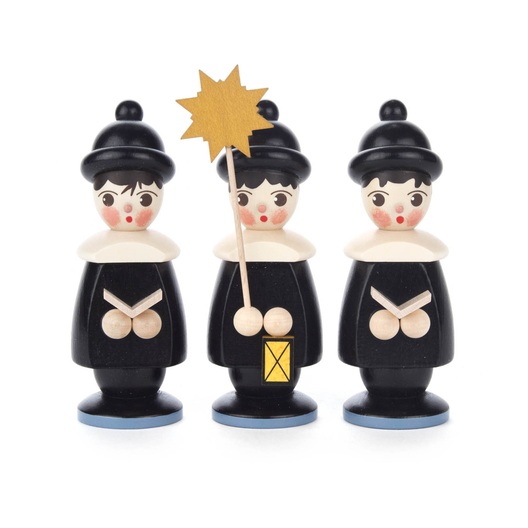 Drei schwarze Kurrendefiguren mit Mützen und Kragen, eine hält einen Stern und eine Laterne. im Dregeno Online Shop günstig kaufen