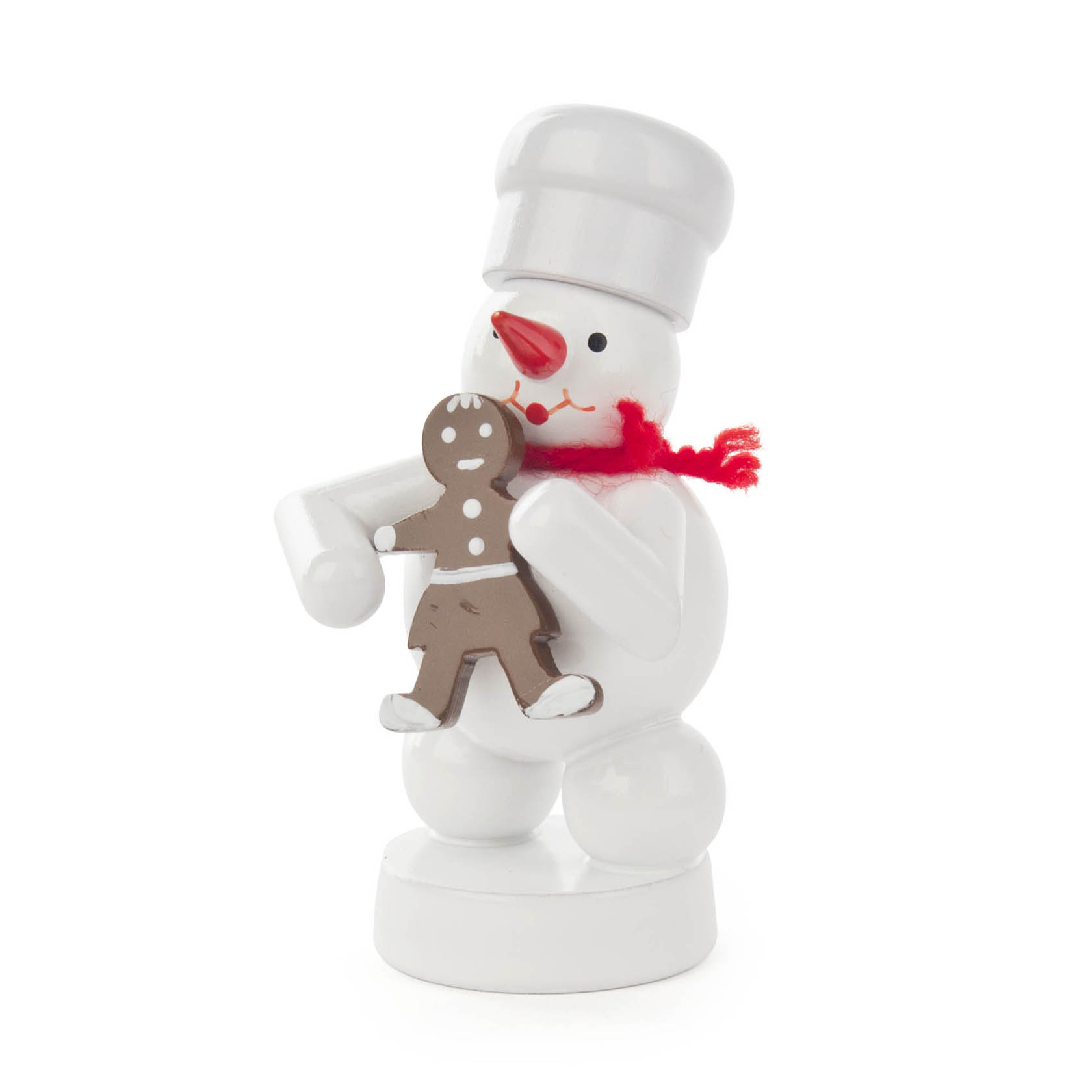A snowman figurine dressed as a baker with a white hat holding a gingerbread woman, adorned with a red scarf. im Dregeno Online Shop günstig kaufen