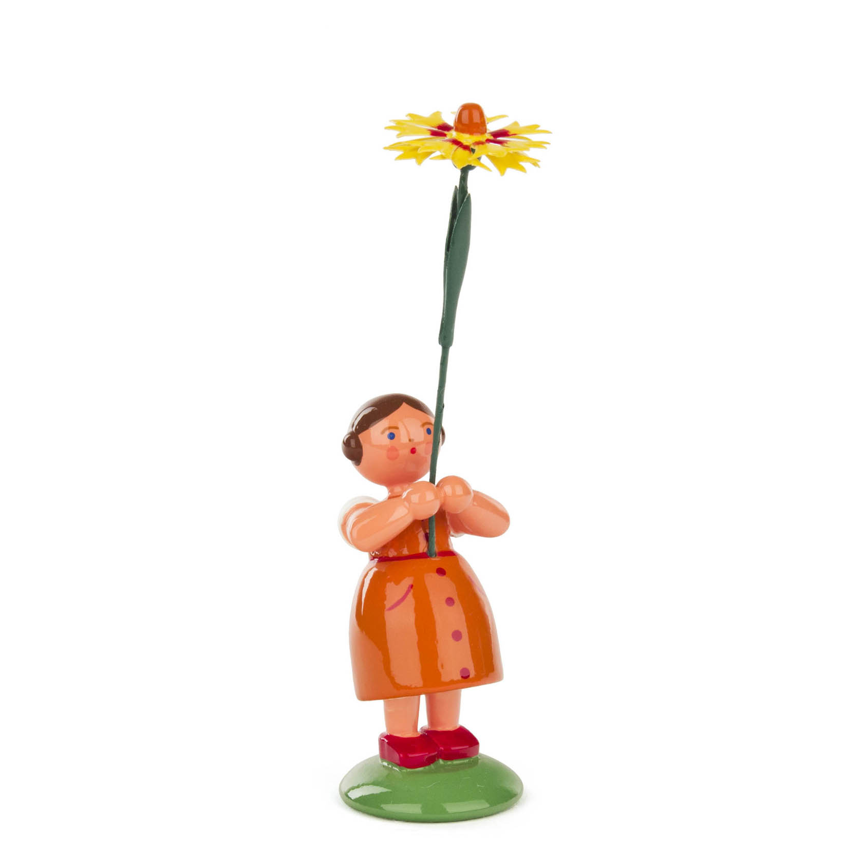 A painted wooden figure of a girl in an orange dress holding a tall yellow flower with a red center. im Dregeno Online Shop günstig kaufen