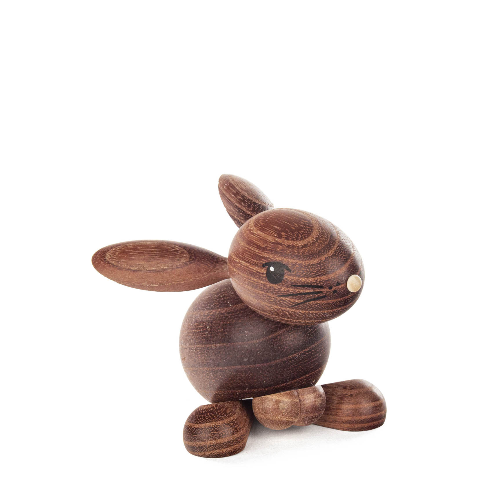 Holzfigur eines dunklen Hasen mit dem Namen 'Hansi'. Der Hase ist aus einem dunkelbraunen Holz gefertigt und hat eine schnörkellose, glatte Oberfläche und runde Formen. im Dregeno Online Shop günstig kaufen