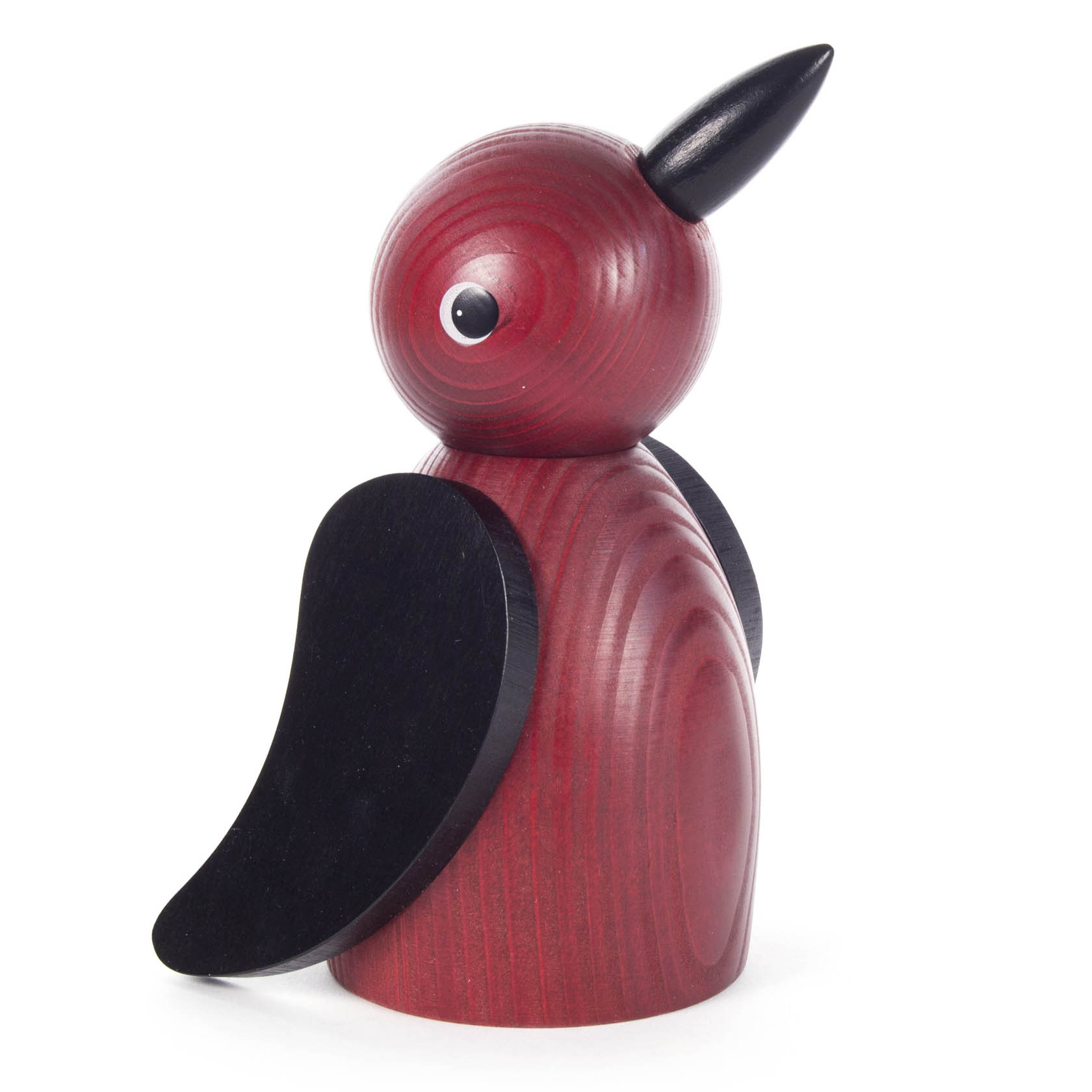 A large wooden bird figurine with a red body and black wings and beak.