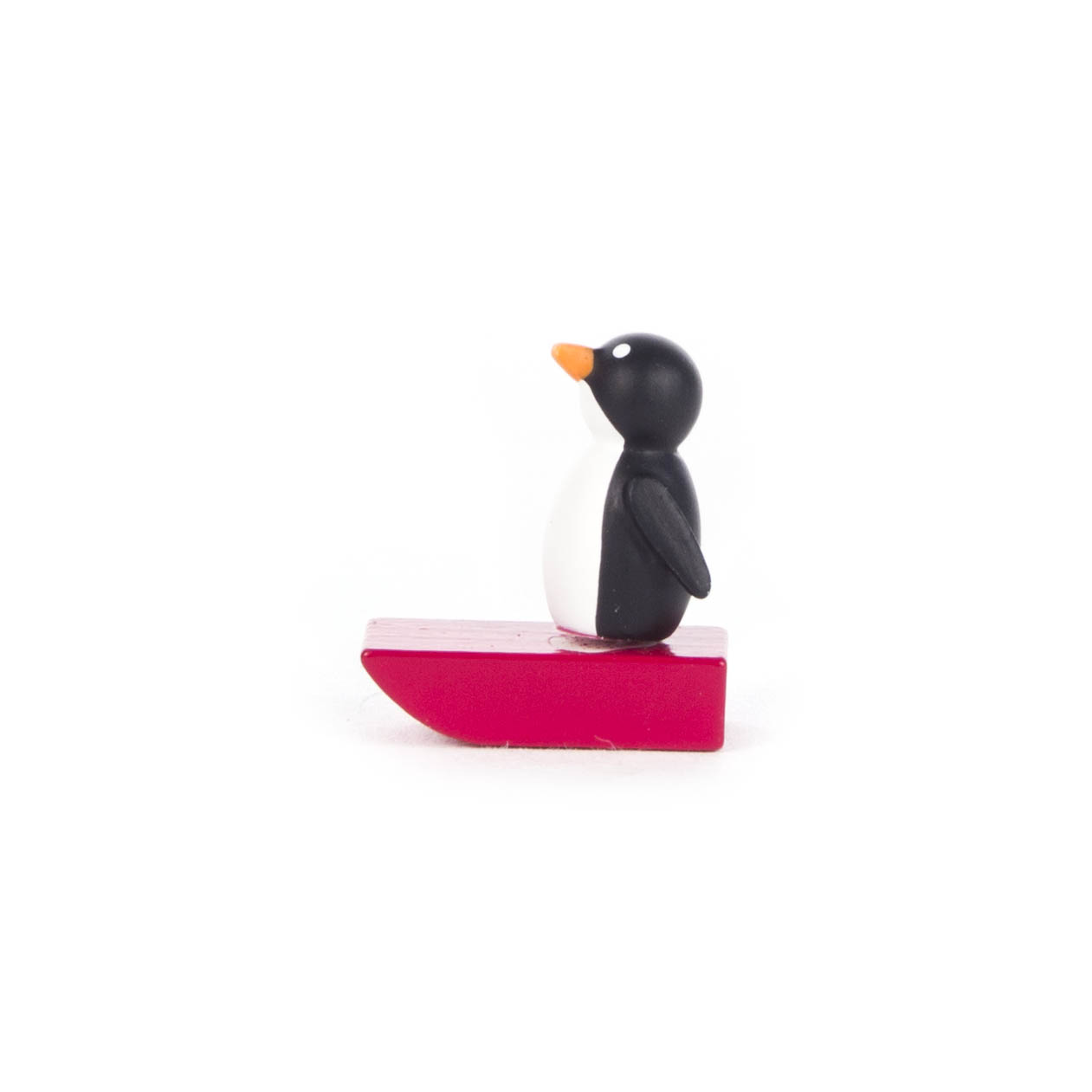 Pinguin auf Schlitten klein, rot im Dregeno Online Shop günstig kaufen