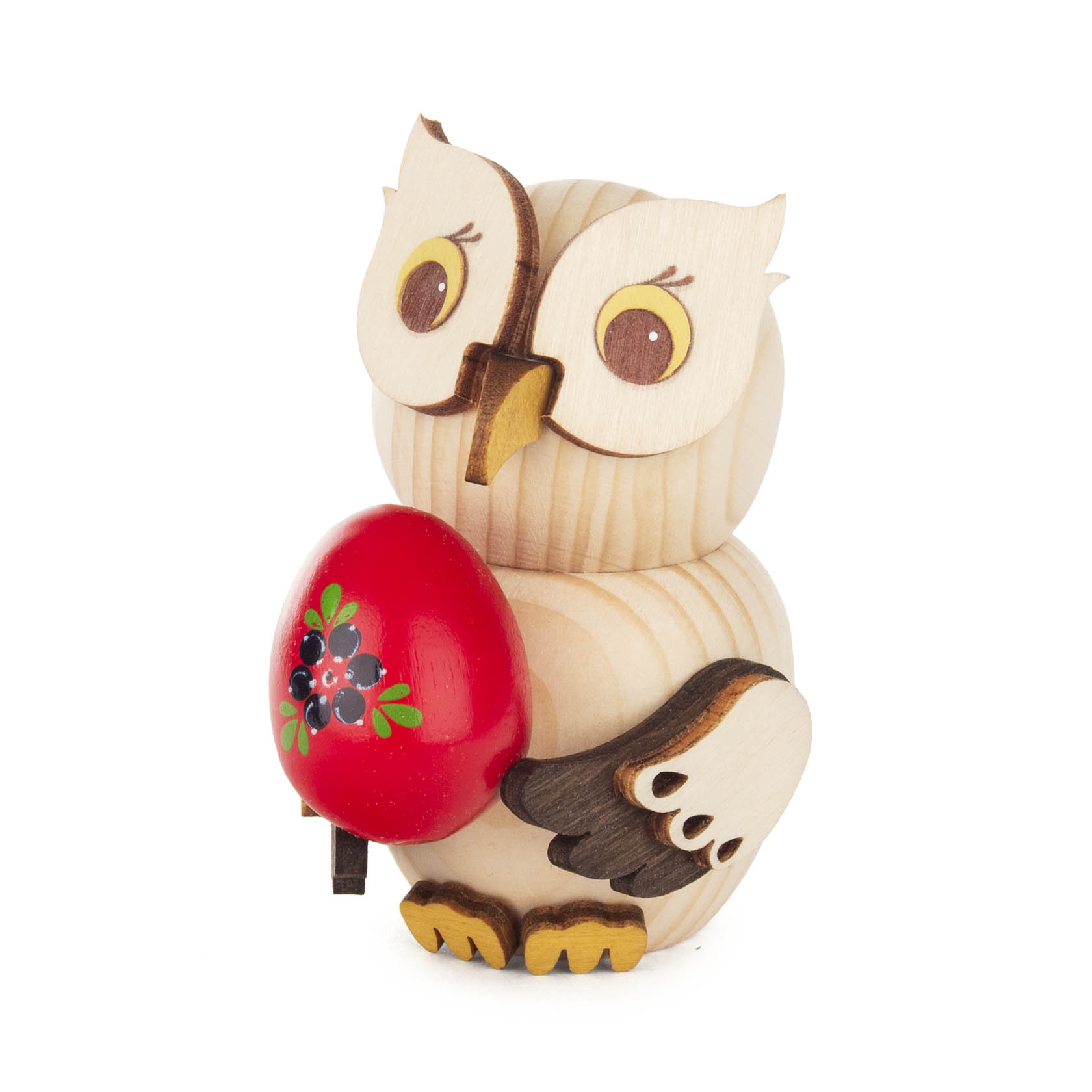 A small wooden owl figure holding a red egg decorated with black flowers. im Dregeno Online Shop günstig kaufen