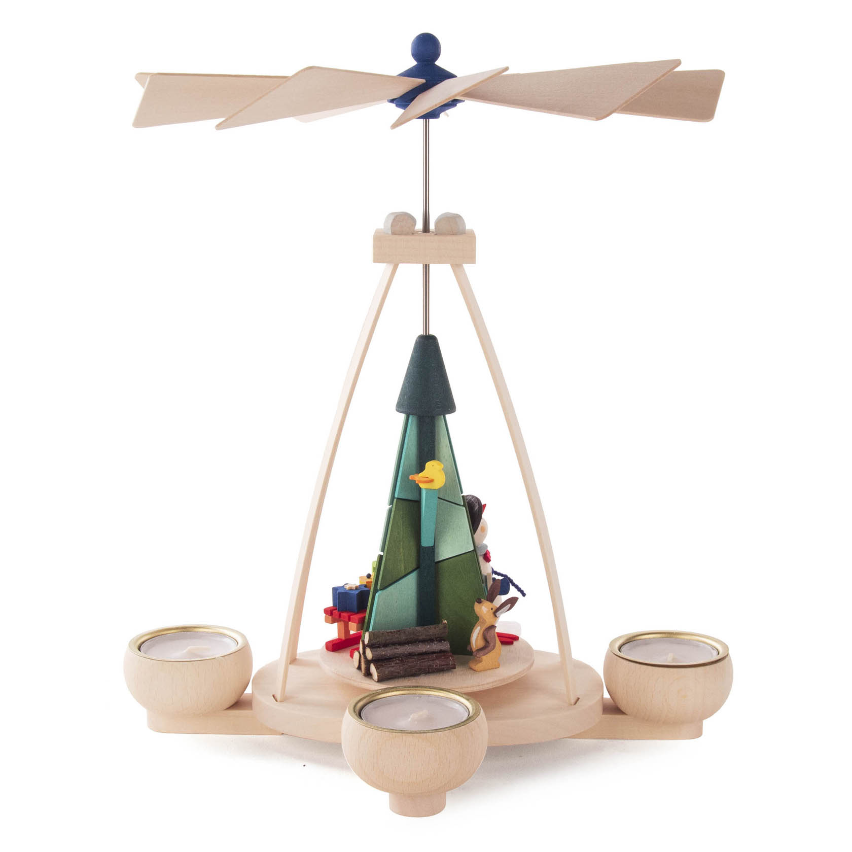 A wooden candle pyramid with tealight holders, featuring a tree with a snowman, gifts, and animals at the base, with a rotating propeller on top.